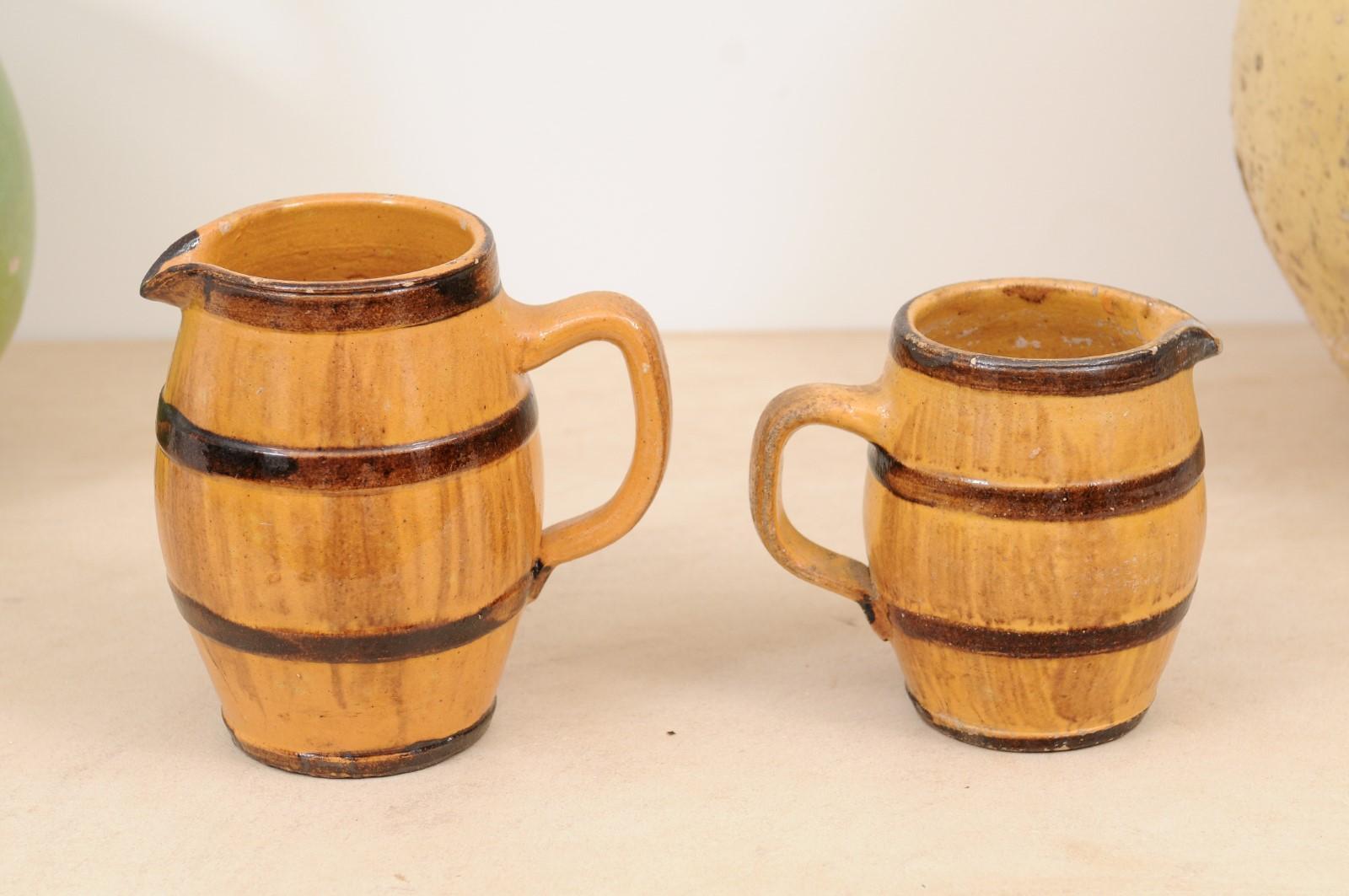 Two Rustic French 19th Century Pottery Pitchers with Yellow and Brown Glaze For Sale 1