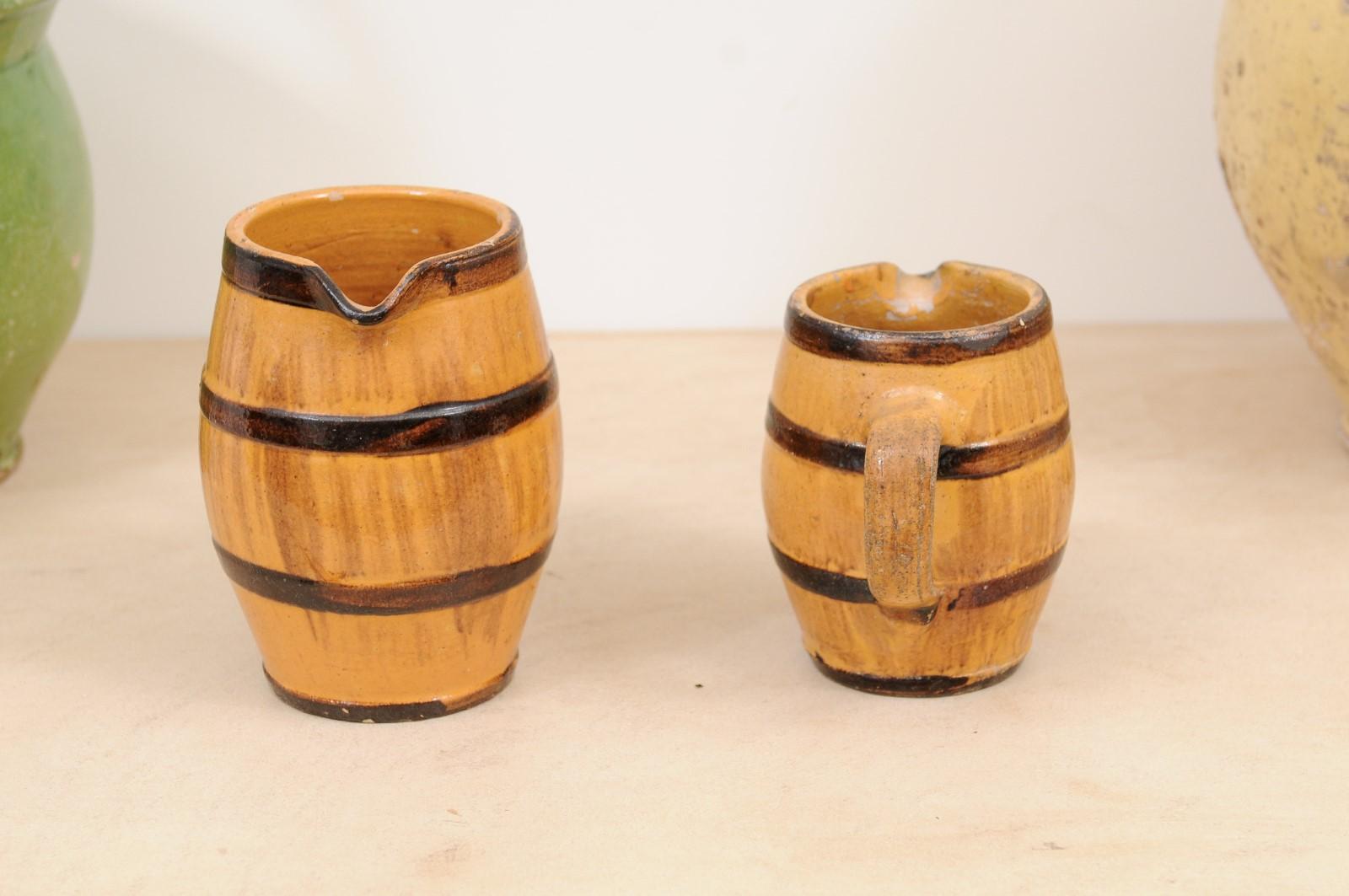 Two Rustic French 19th Century Pottery Pitchers with Yellow and Brown Glaze For Sale 2