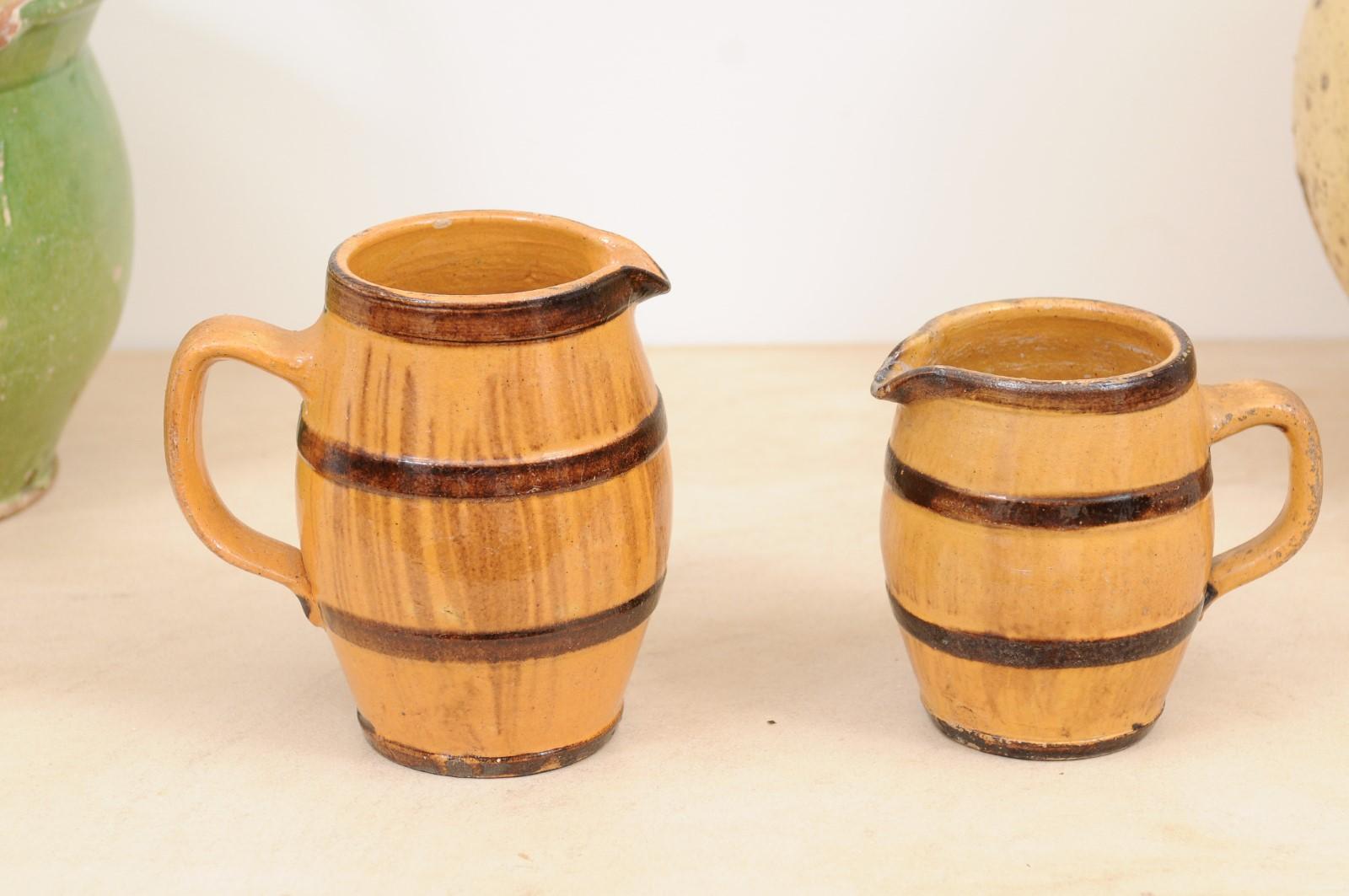 Two Rustic French 19th Century Pottery Pitchers with Yellow and Brown Glaze For Sale 3