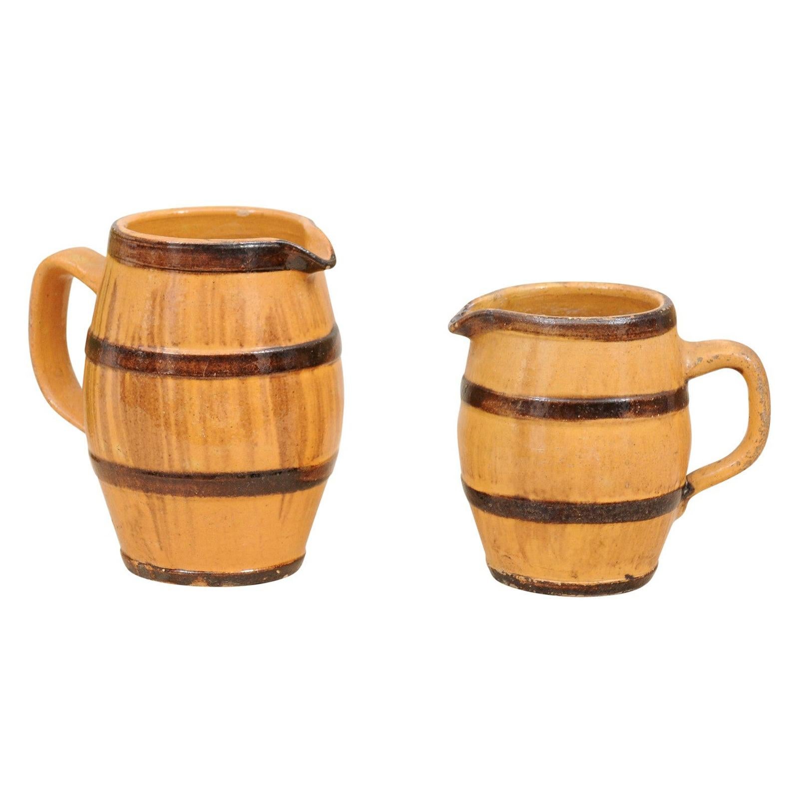 Two Rustic French 19th Century Pottery Pitchers with Yellow and Brown Glaze For Sale