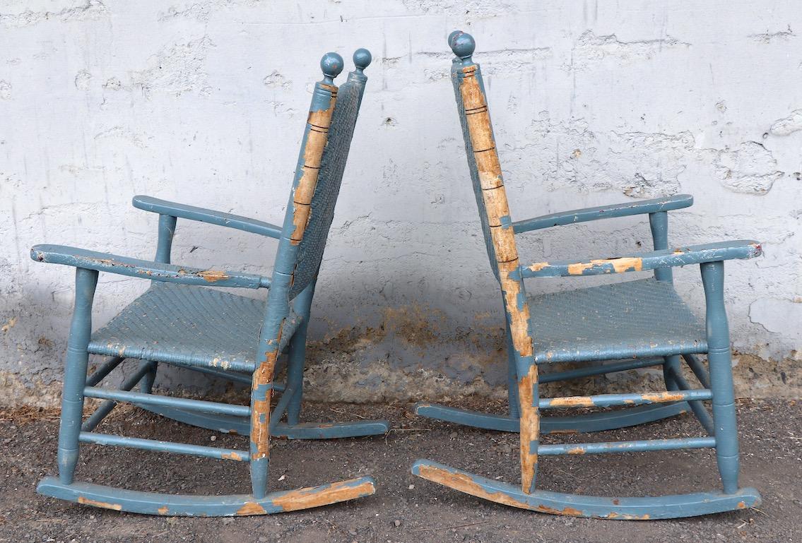 20th Century Two Rustic Porch Rockers in Peely Paint Finish