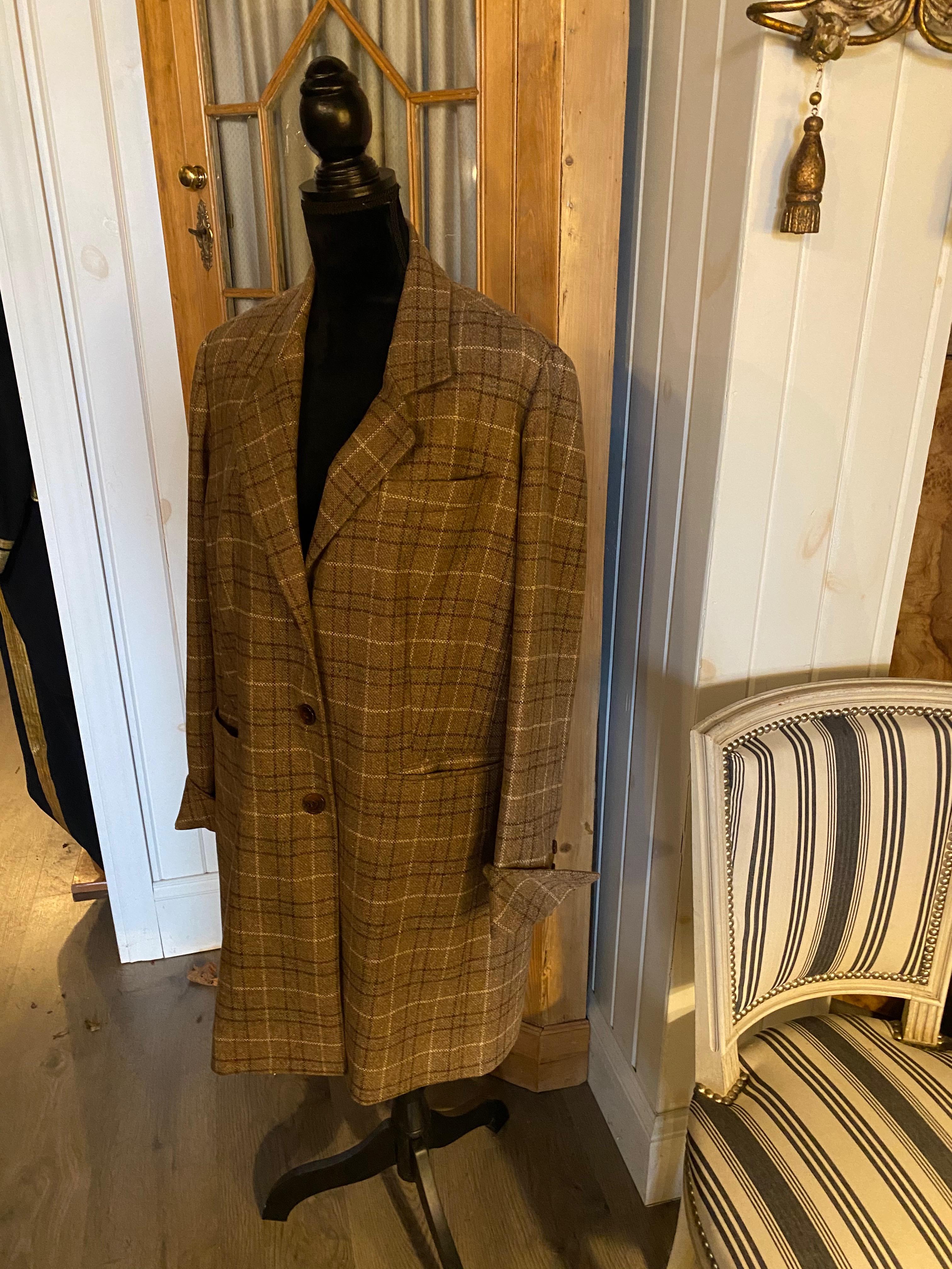 TWO SAM KORI GEORGE CASHMERE COATS.
Priced per coat. Only worn once.
Comprising of a grey and yellow window pane coat and a brown, blue, and white plaid
Approximately size 10-12

