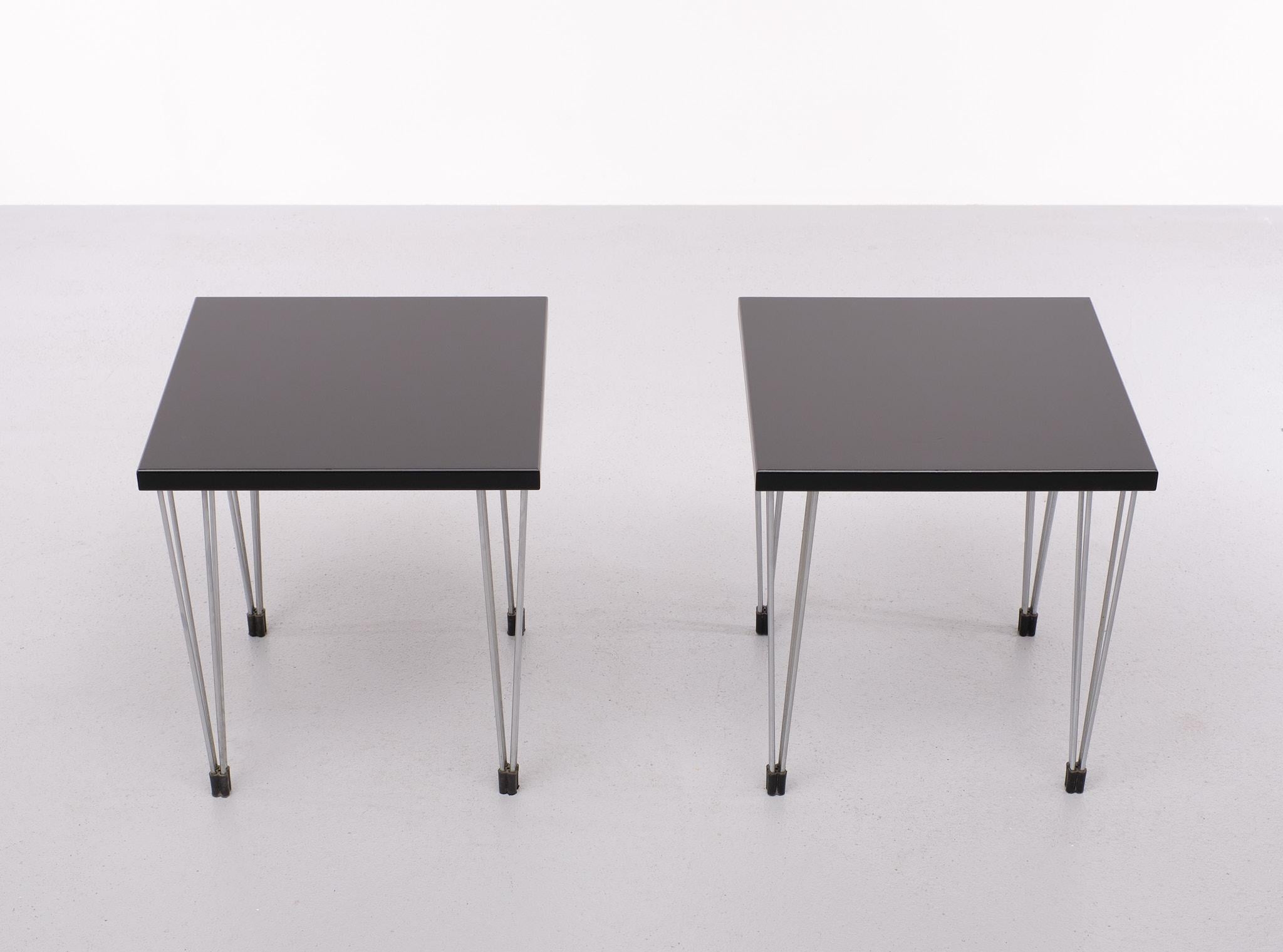 Two very nice attractive side tables . Chrome hairpin legs ,comes with a 
Black top . made in Denmark .1970s 