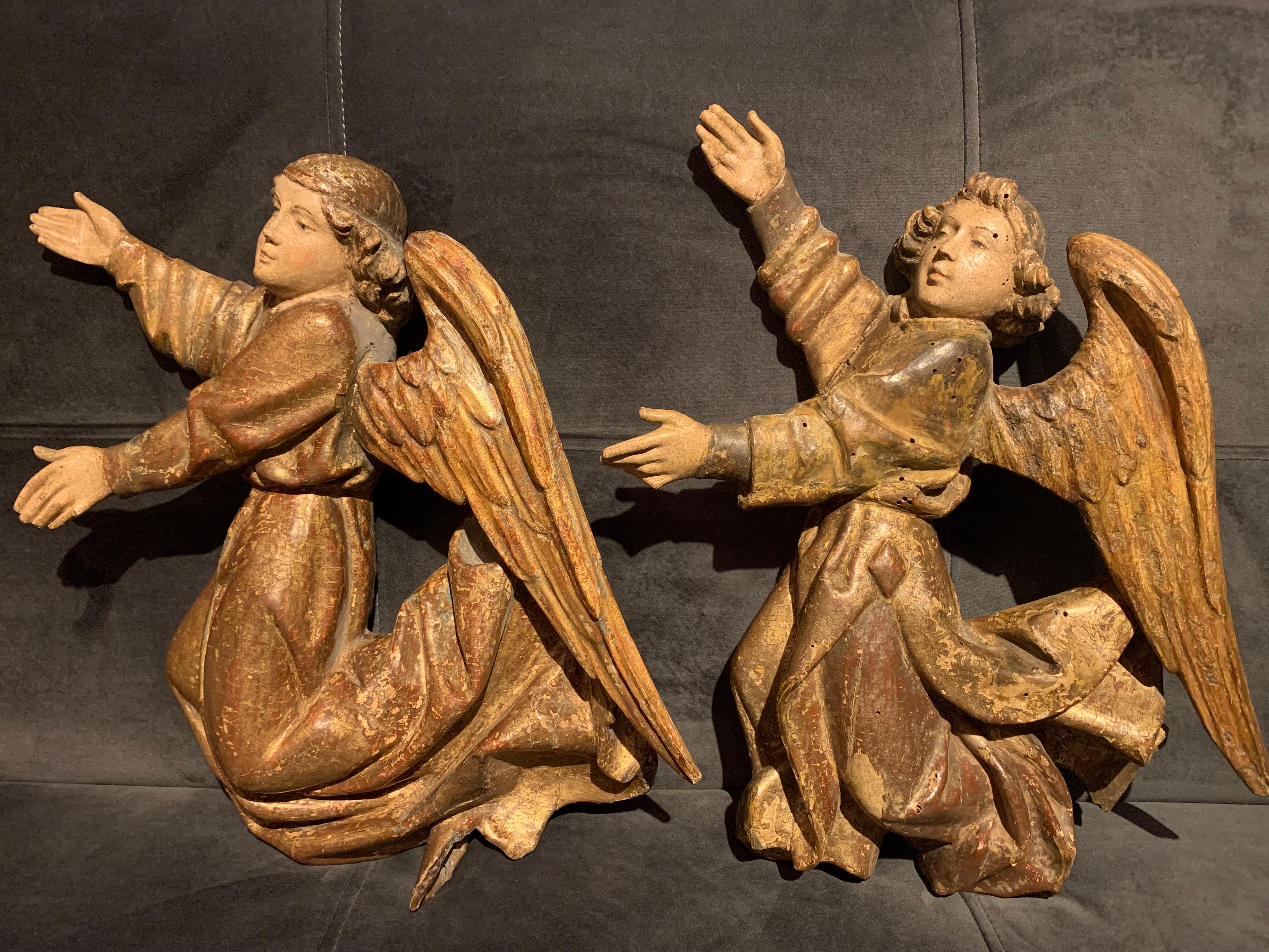 Two  Sculpted Wooden Angels , Flanders, Early 16th century. 1