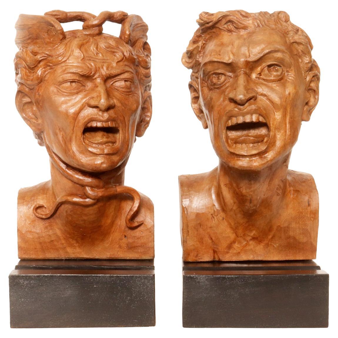 Deux sculptures représentant la tête de Méduse et la tête d'un homme, Italie 1900. en vente