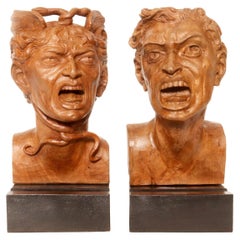 Deux sculptures représentant la tête de Méduse et la tête d'un homme, Italie 1900.