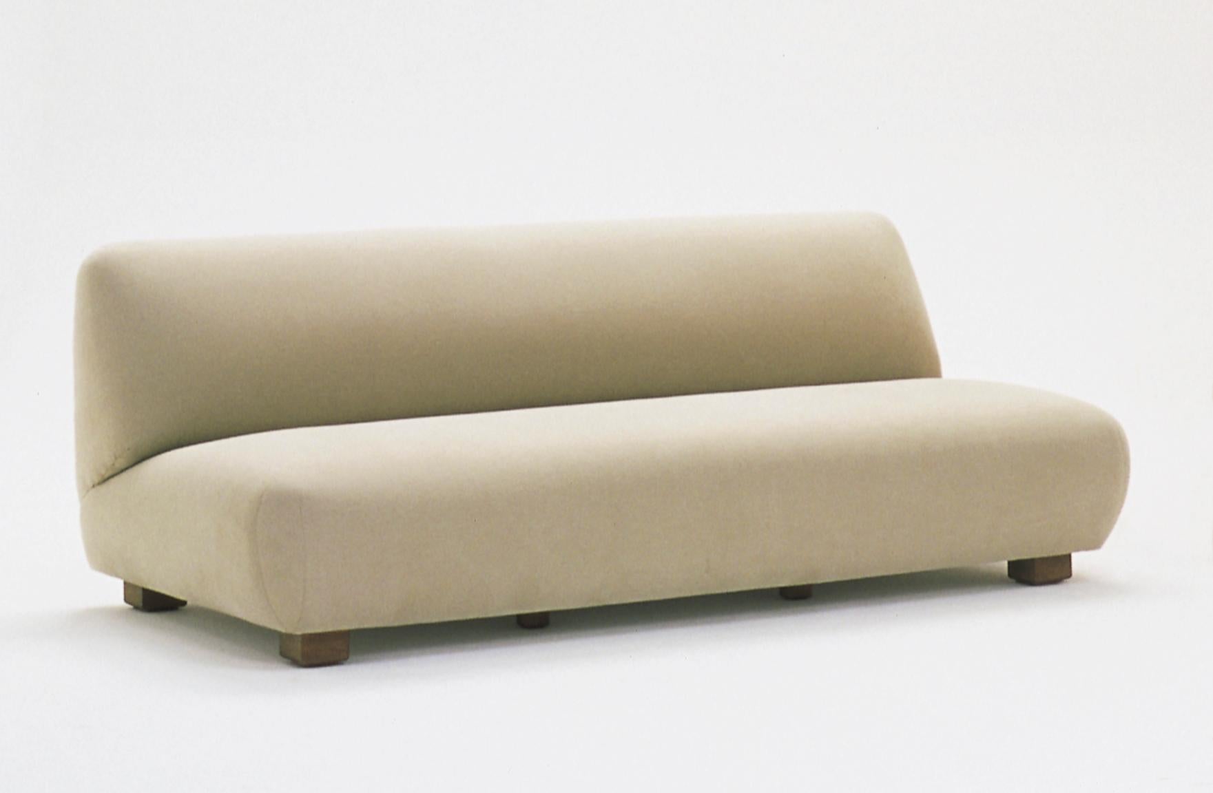 Two seat cadaqués sofa by Federico Correa, Alfonso Milá
Dimensions: D 100 x W 200 x H 75 cm
Materials: beech wood, fabric.
Available in other fabrics and in 2 sizes: L200 (two seat), L250 (three seat) cm.

The Cadaqués ensemble sums up an