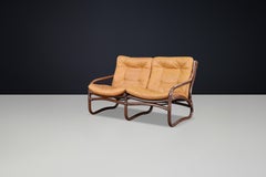 Loveseat de dos plazas "Ecco" de Slettvoll en cuero coñac y ratán, Noruega Años 70