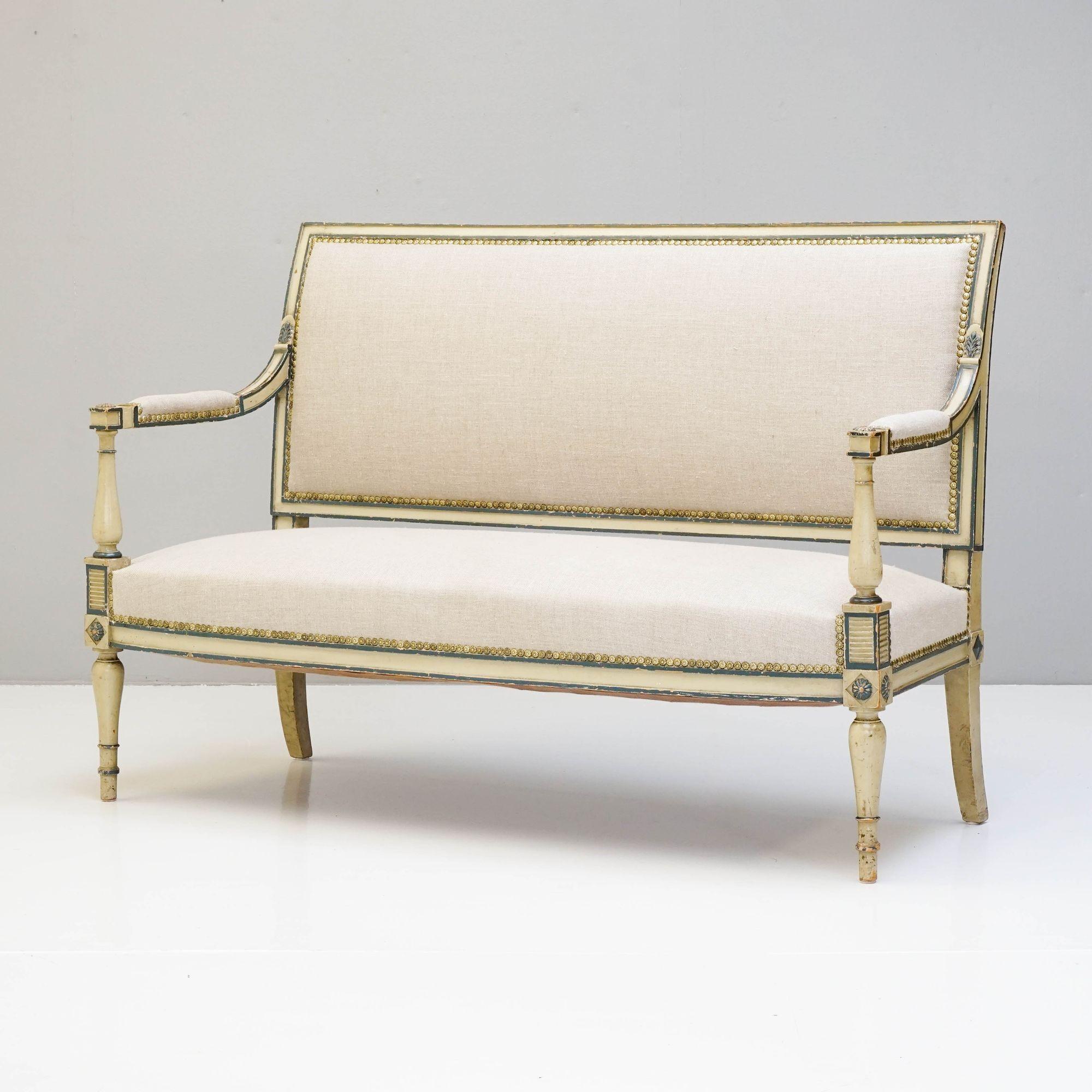 French empire style two seat canapé in original paint finish reupholstered in linen.

H 93cm x W 143cm x D 63cm x SH 39cm