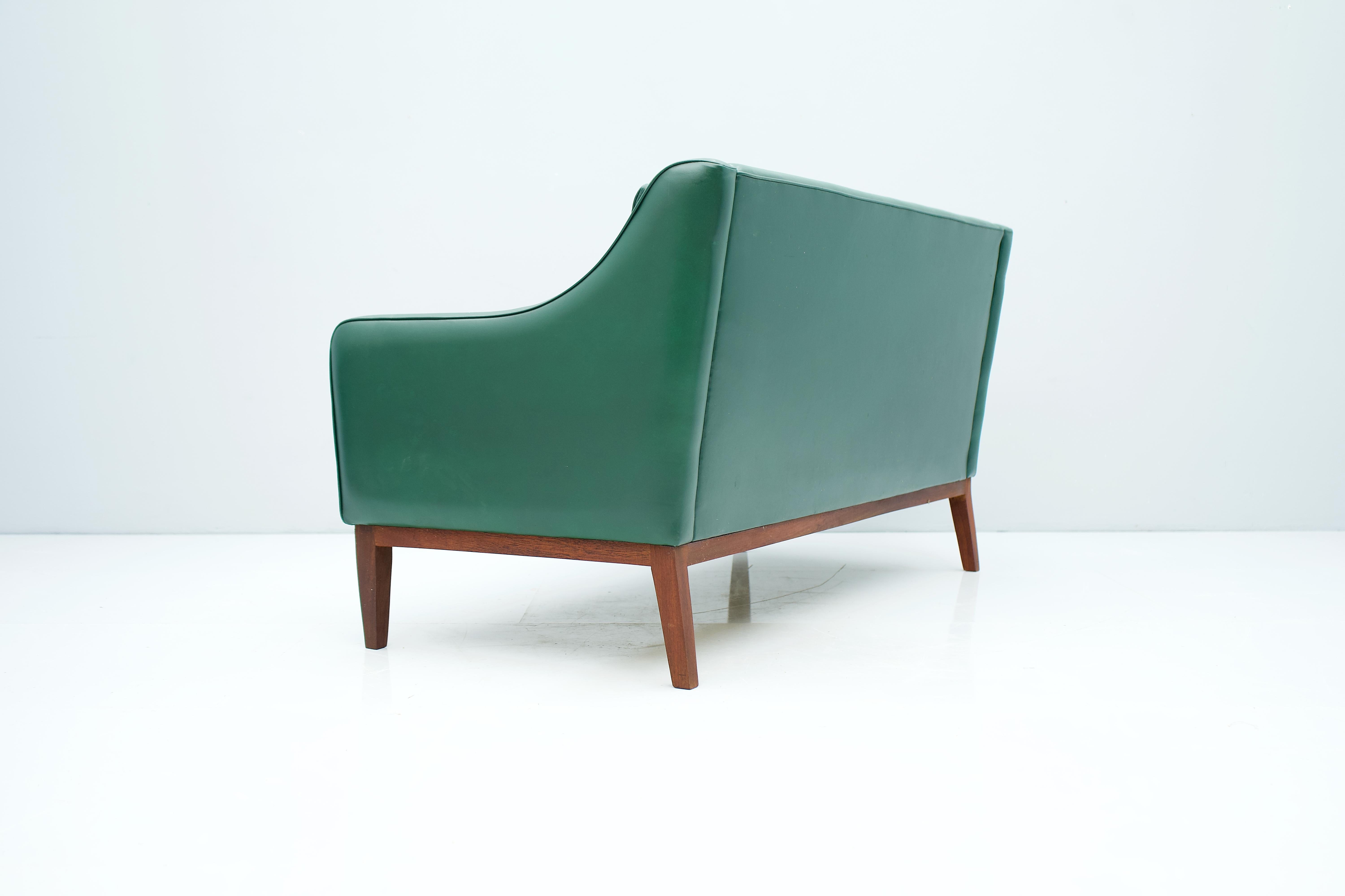 green italian leather sofa
