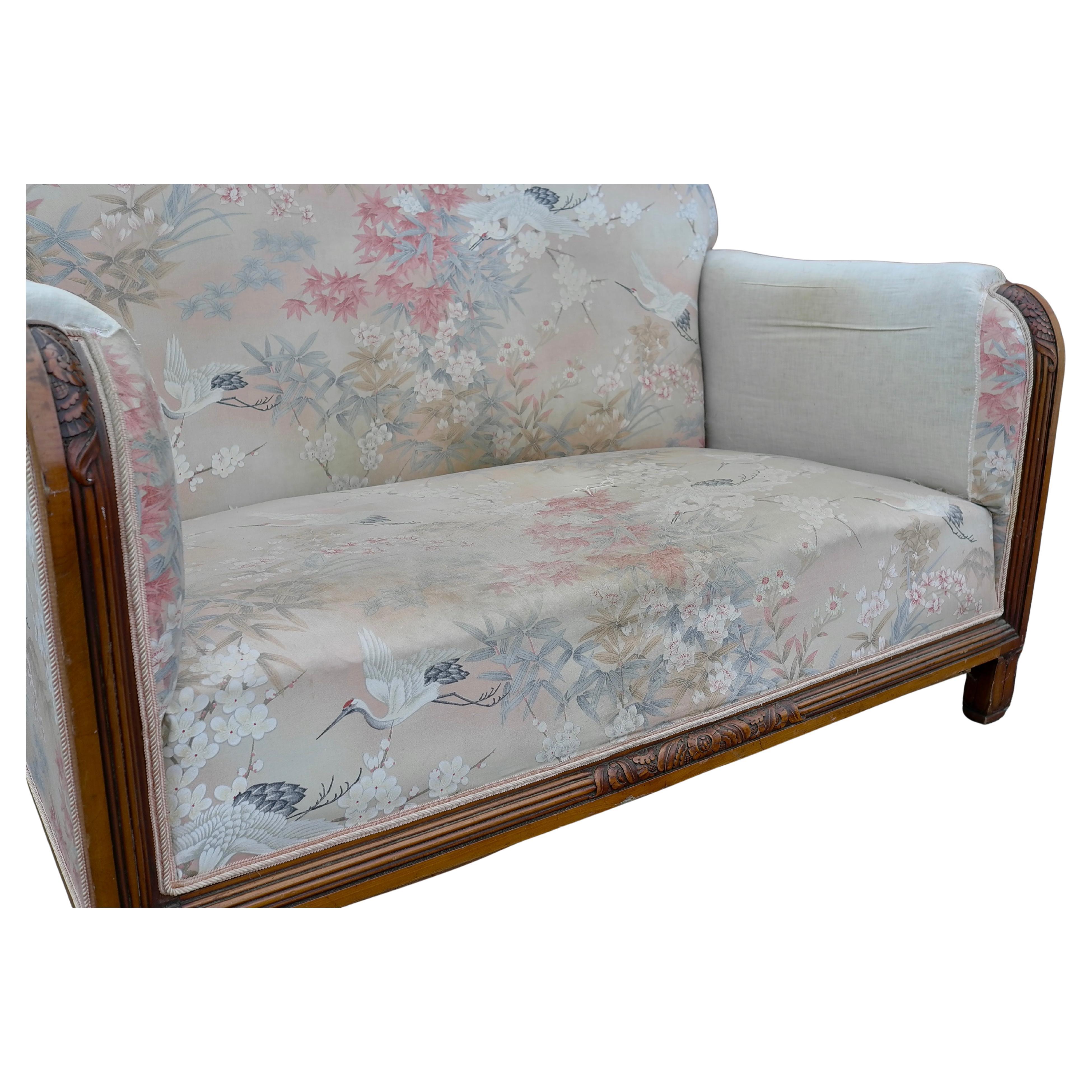 Zweisitziges Sofa Maurice Dufrene, mit floralen Schnitzereien, Frankreich 1920er Jahre (Französisch) im Angebot