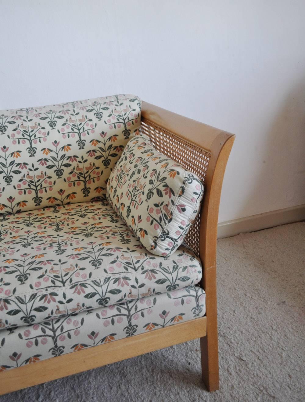 Two-seat sofa by Arne Norell. Model Rotang made of beech, side sections and back with woven cane. Loose cushions. Labeled.
Fine vintage condition with signs of wear.
Can be shipped disassembled.