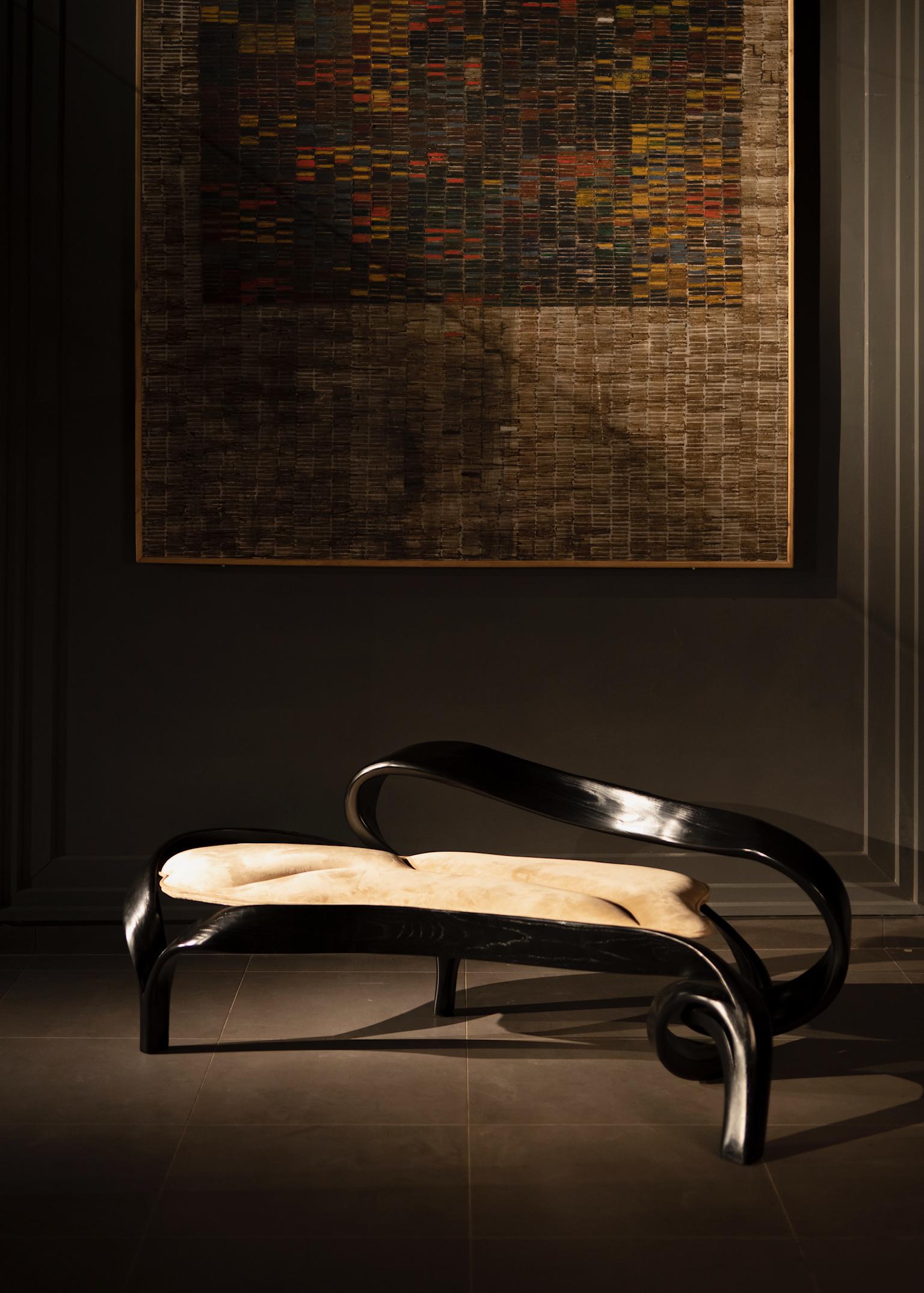 The Two Seater No. 2, a chassis designed by Raka Studio using an ancient Japanese technique of bending wood. The design is inspired by the organic flows of nature and the natural shapes that occur in a natural landscape. Each design element