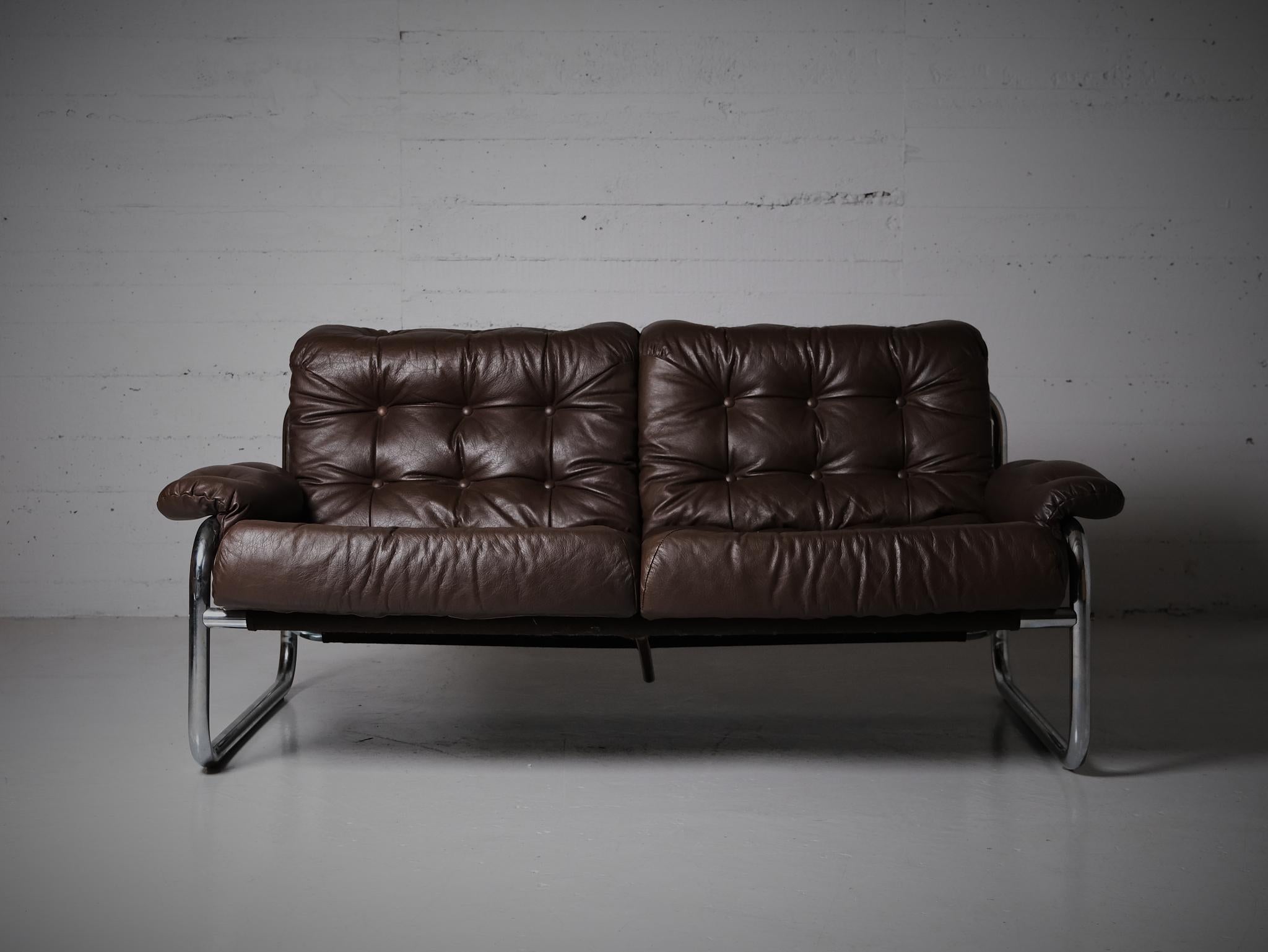 Sought after sofa designed by John Bertil Häggström for IKEA, Sweden, during the 1970s.

Made in chrome with leather cushions.

Whole group available in our store with three-seater sofa and lounge chair. 