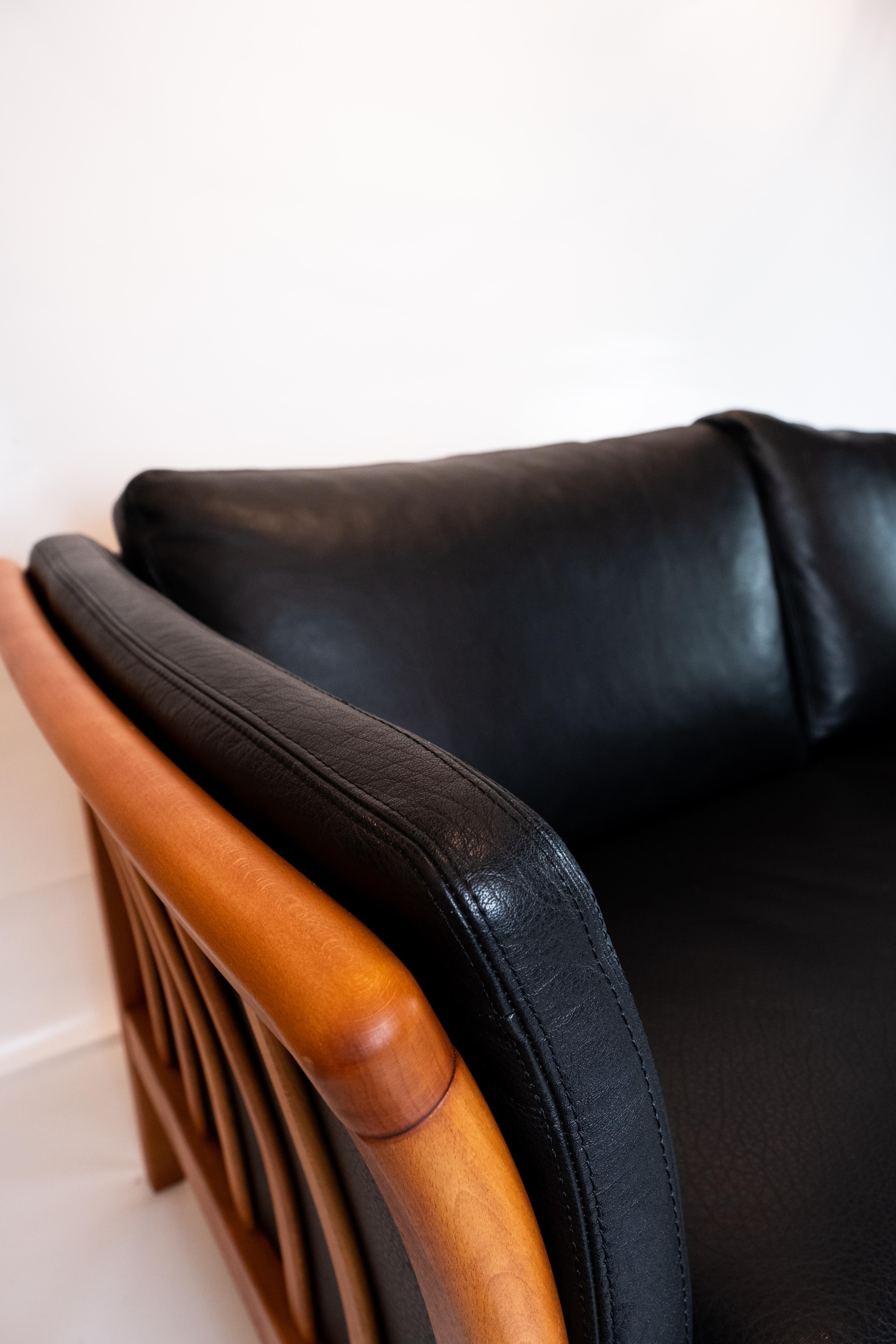 Mid-20th Century Two-Seat Sofa Upholstered with Black Leather and of Danish Design For Sale