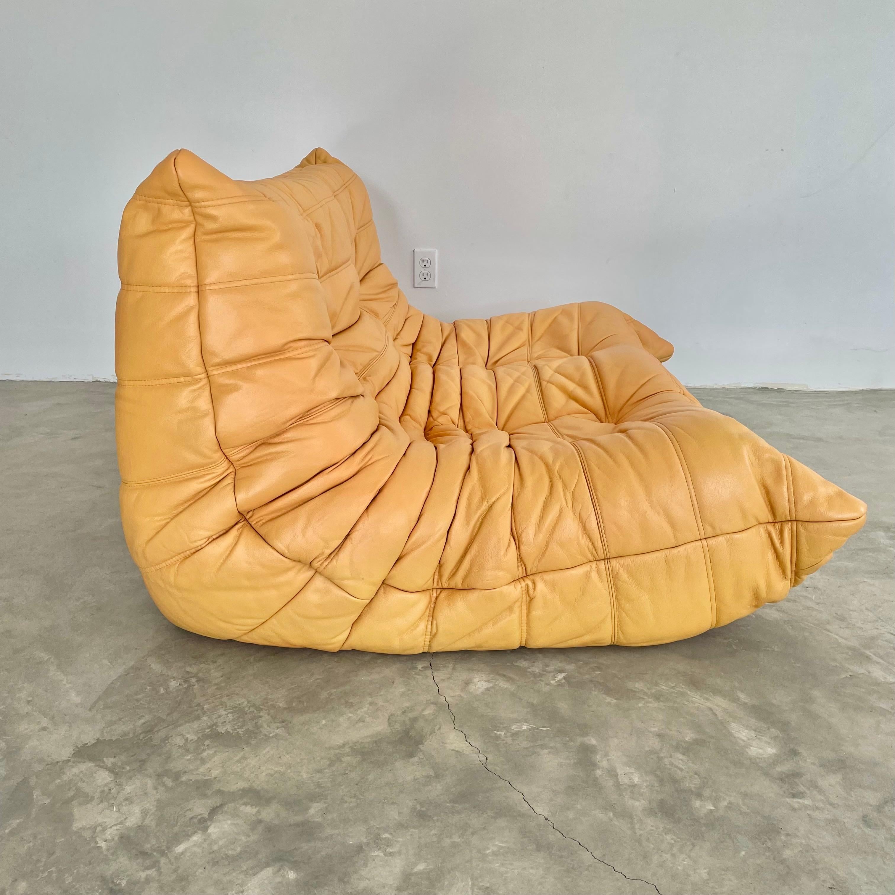 French Two Seater Togo Sofa in Yellow Leather by Ligne Roset, 1980s France For Sale