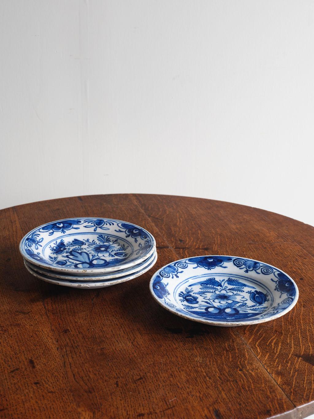 These sets of Delft Dutch plates would be a lovely addition to a dining room or would make beautiful decorations displayed on a wall or resting on a buffet or credenza. There are 4 plates total, and they do all have minor chips and scratches because