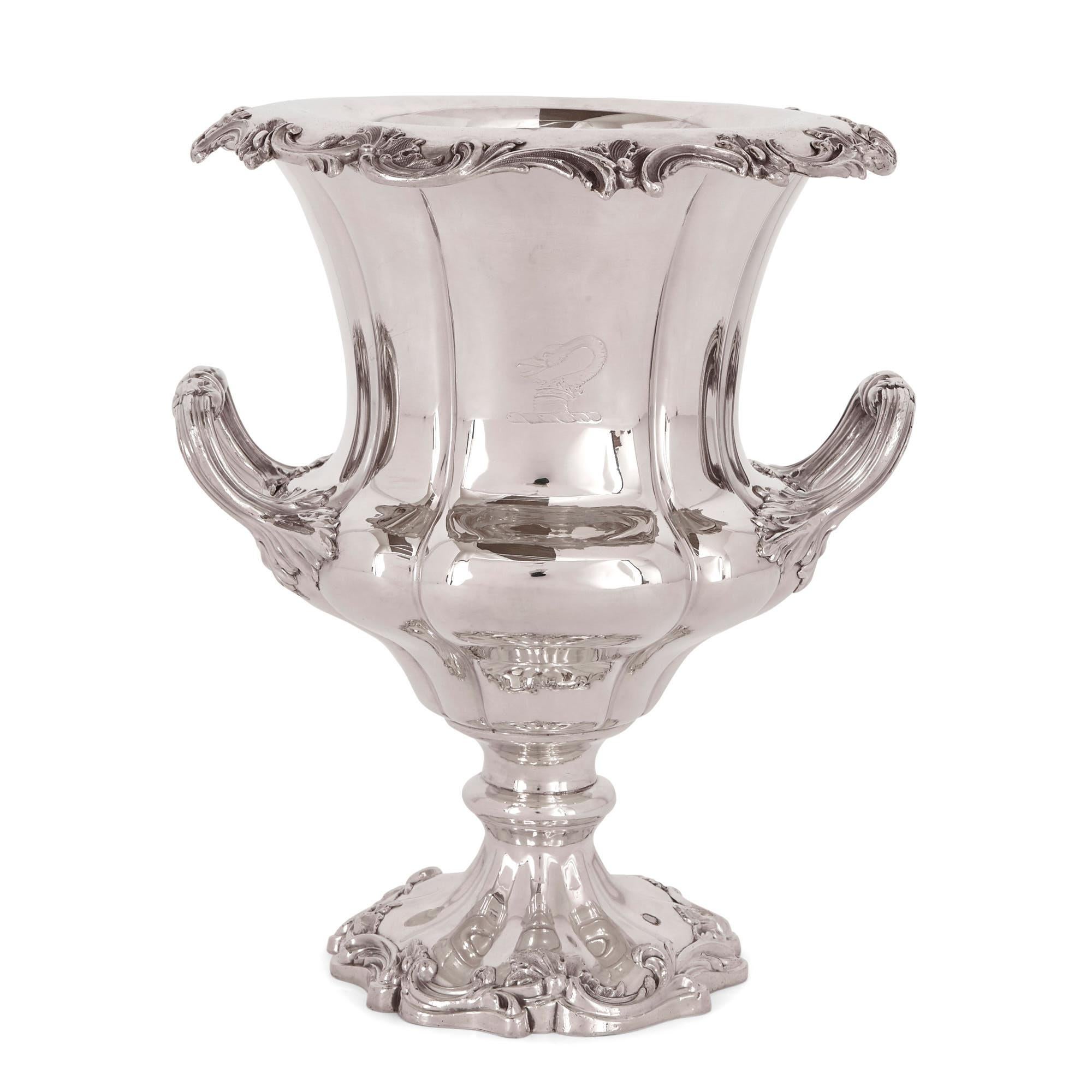 These exquisite silver plated wine coolers are designed in the form of the famous Medici vase. The so-called Medici vase was an ancient bell-shaped krater that was rediscovered in Rome in the Renaissance period.

The wine coolers feature