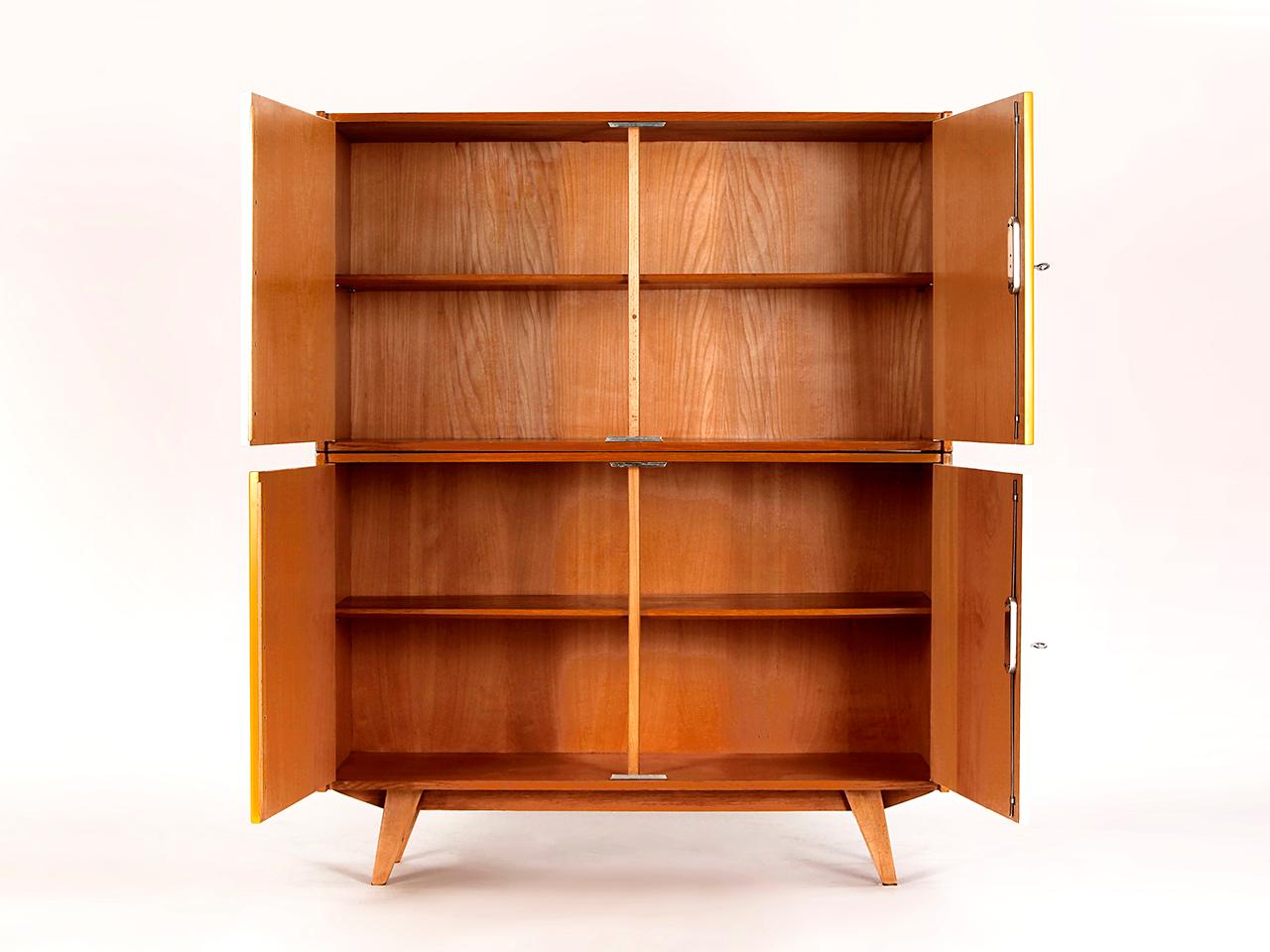 Designed by Jiri Jiroutek in former Czechoslovakia. Produced by Interier Praha (labelled at the back) during the 1960s. These sideboards were specifically designed to be stacked upon one another. To use the sideboards individually each of them has