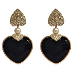 Boucles d'oreilles en or rose 18 carats avec pierre de lune blanche à deux faces et cœur en onyx noir