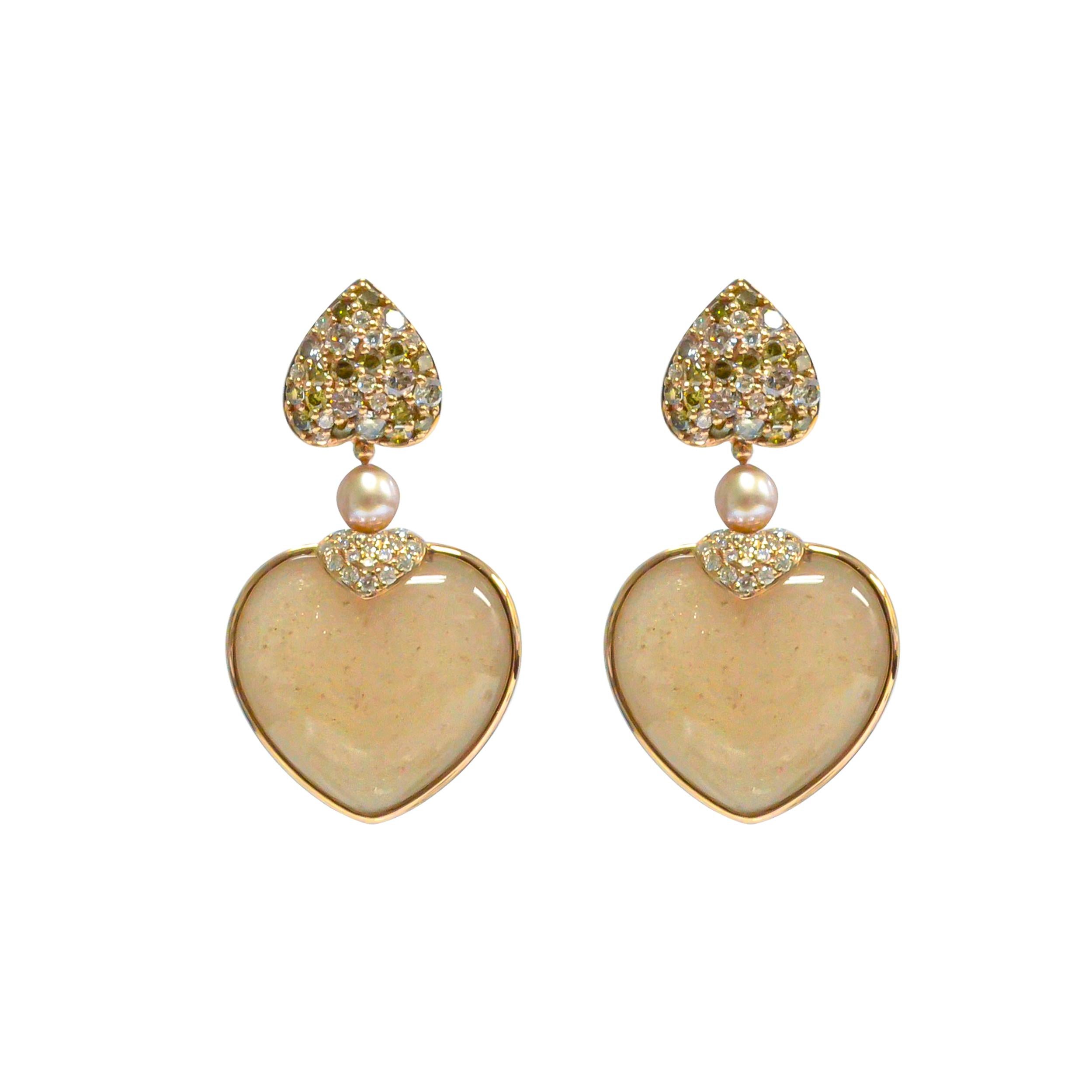 Celebrating the season of love with these cute and dainty heart shaped earrings! The earrings are two-sided and you can easily turn them as your heart desires! Light and easy to wear these earrings showcase beautiful opaque gemstones accented with