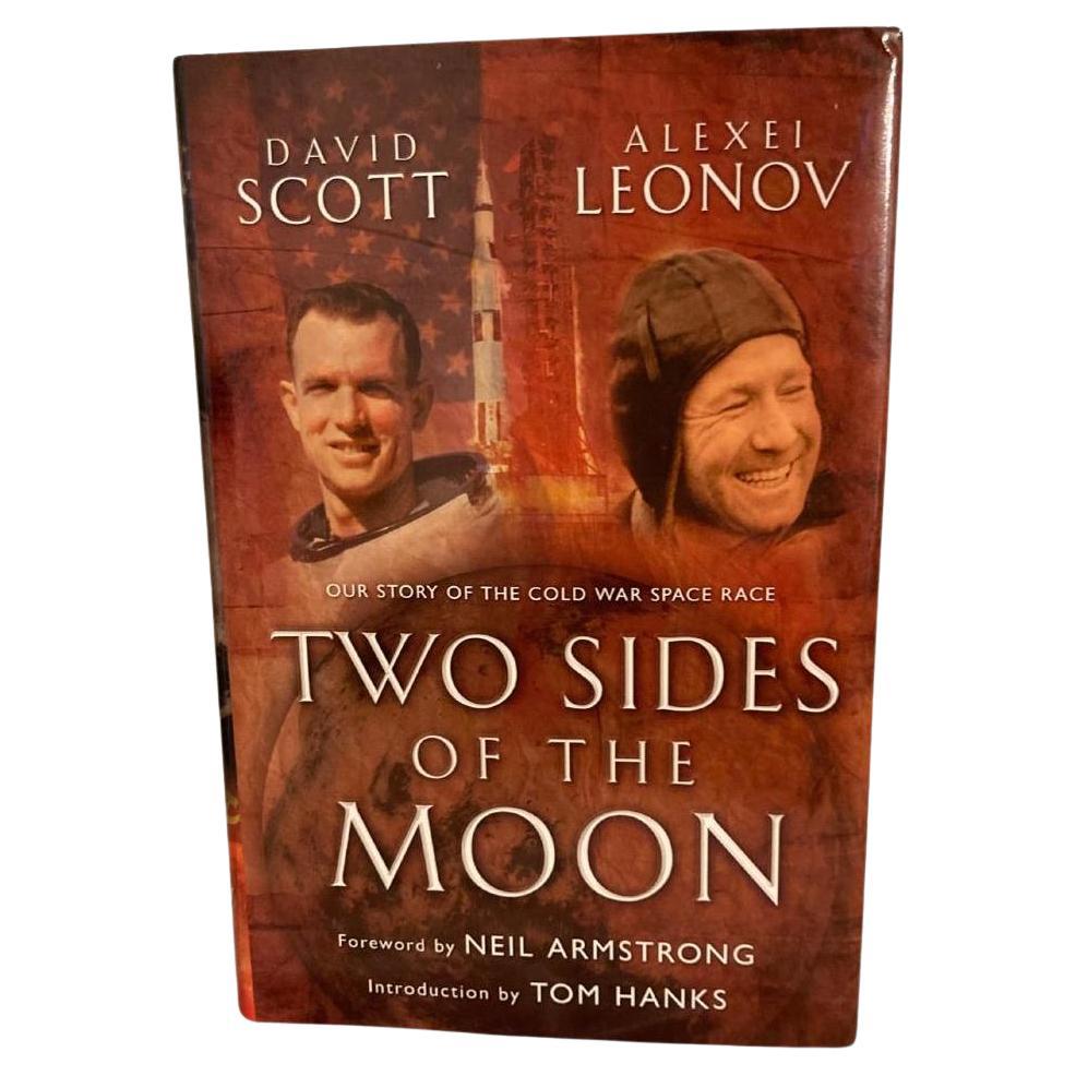 Scott, David and Alexei Leonov, with Christine Toomey. Two Sides of the Moon: Our Story of the Cold War Space Race. New York: Thomas Dunne Books, 2004. First U.S. Edition. Signed by Scott on the full title page. In the original publisher’s hardback