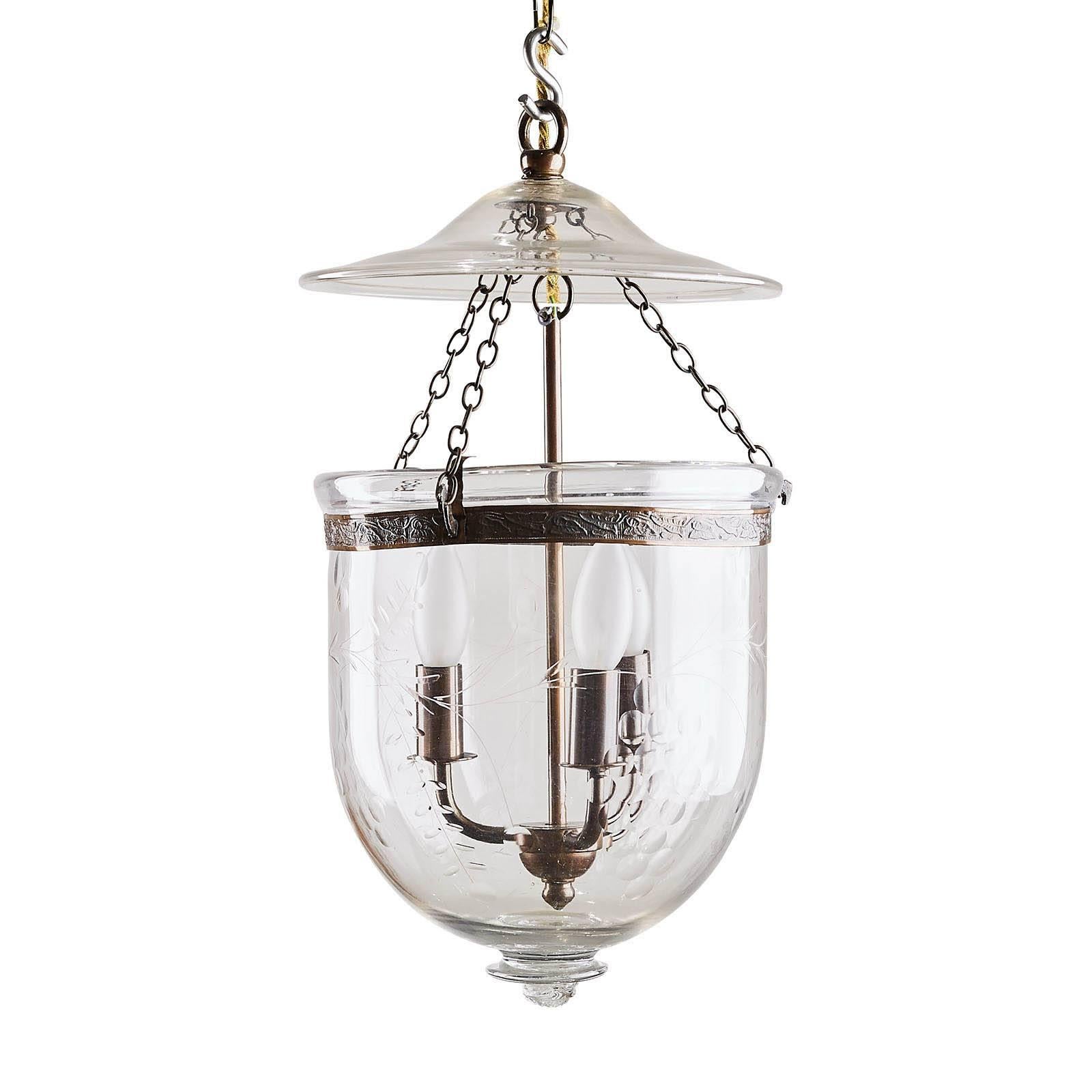 Two similar bell jar lanterns, one marked Austria, both engraved with grapes, Continental, circa 1900.