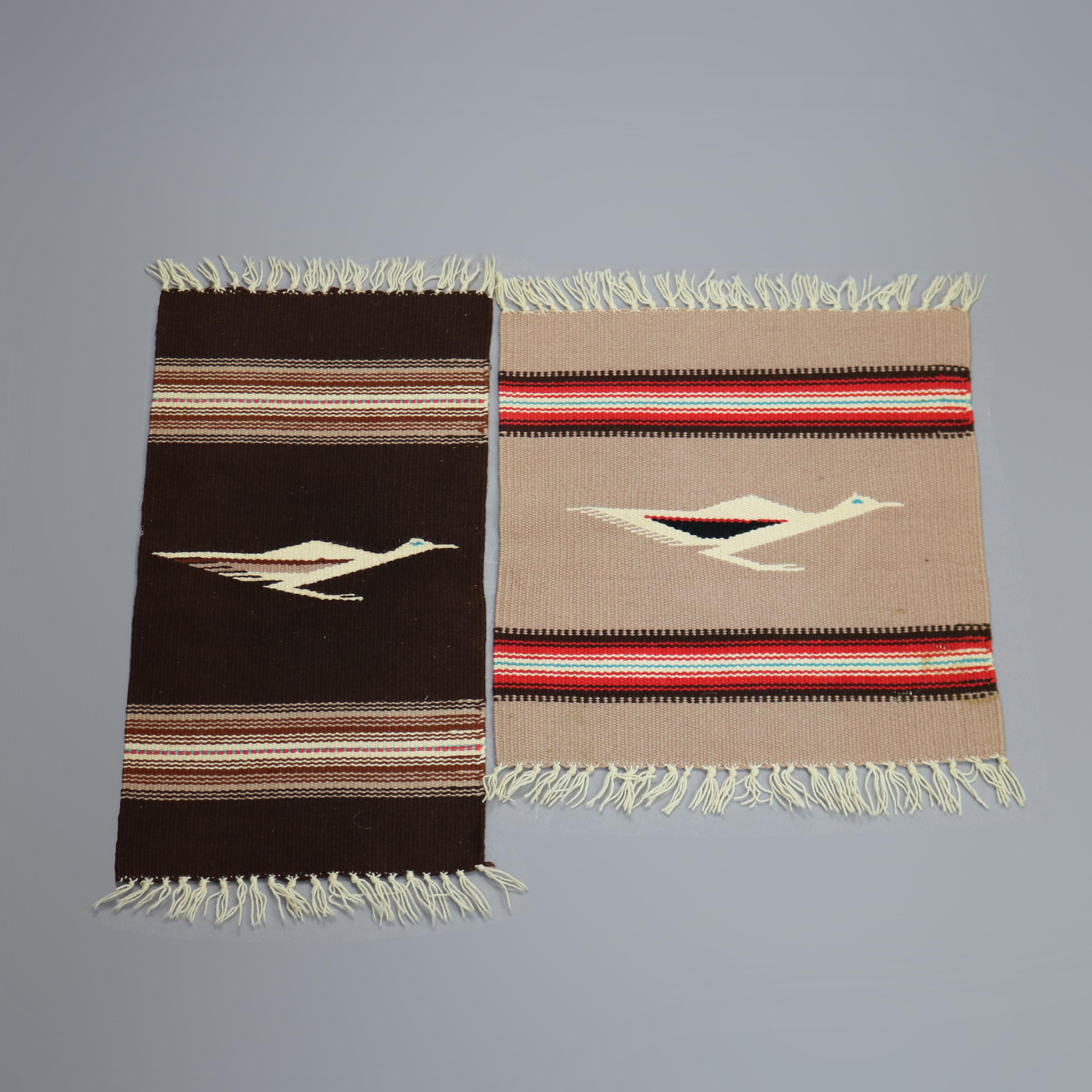 A set of two Southwestern Native American Indian Navajo style rugs offer wool construction with central bird in each, 20th century

Measures - square 15.5'' L x 14'' W x .5'' D; rectangle 19'' L x 10'' W x .5'' D.

Catalogue Note: Ask about