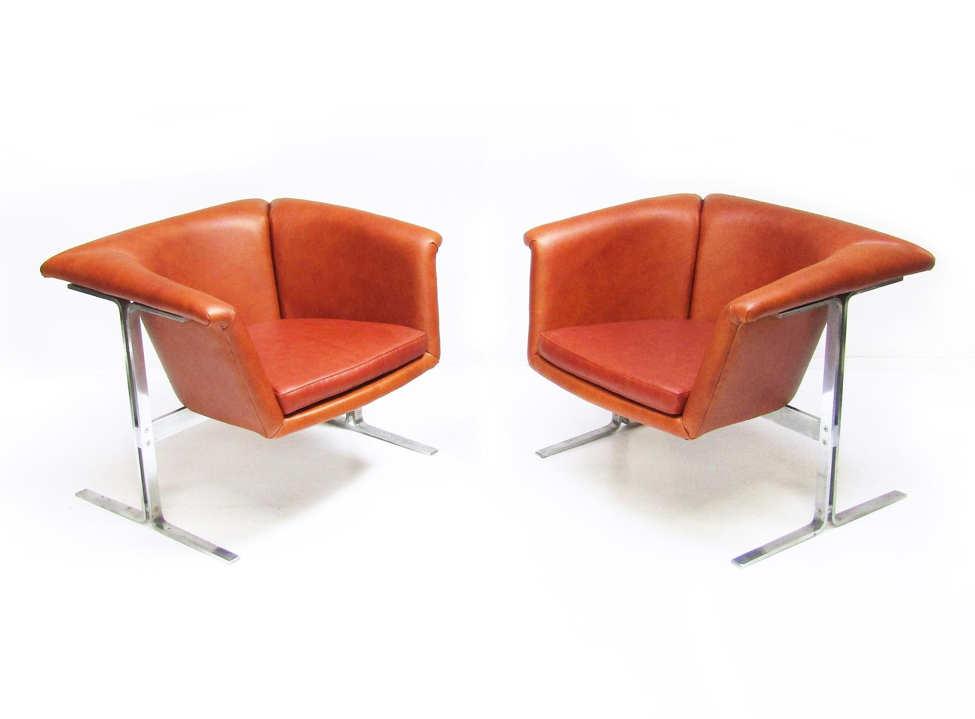 A pair of model 042 chairs in cognac leather by Geoffrey Harcourt for Artifort.

Produced in 1963, Harcourt's 042 chairs were featured in Stanley Kubrik's seminal film 