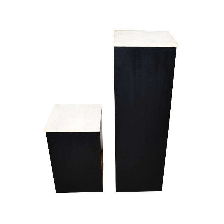 American Two Square Black Marble and Wood Plinth Pedestals with Marble Tops, a Pair For Sale