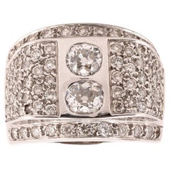 Anello da cocktail con due pietre e diamanti, circa 1940