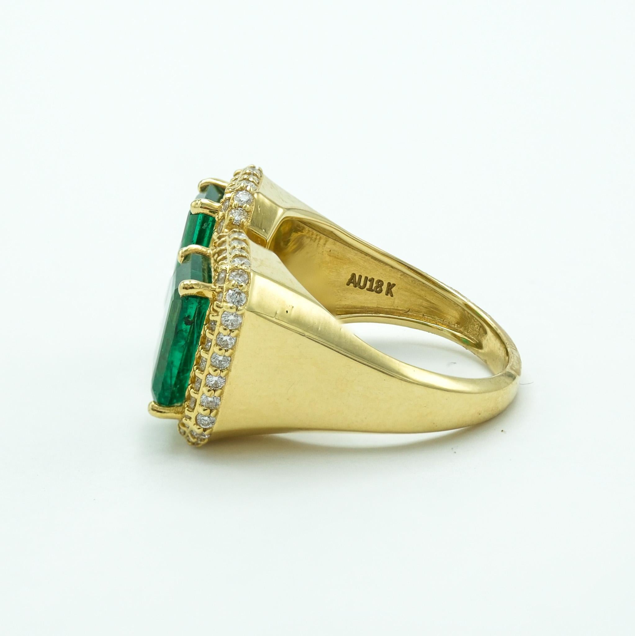 Two-Stone Emerald and Diamond 18 Karat Yellow Gold Emerald Cut Ring In Good Condition For Sale In Fairfield, CT