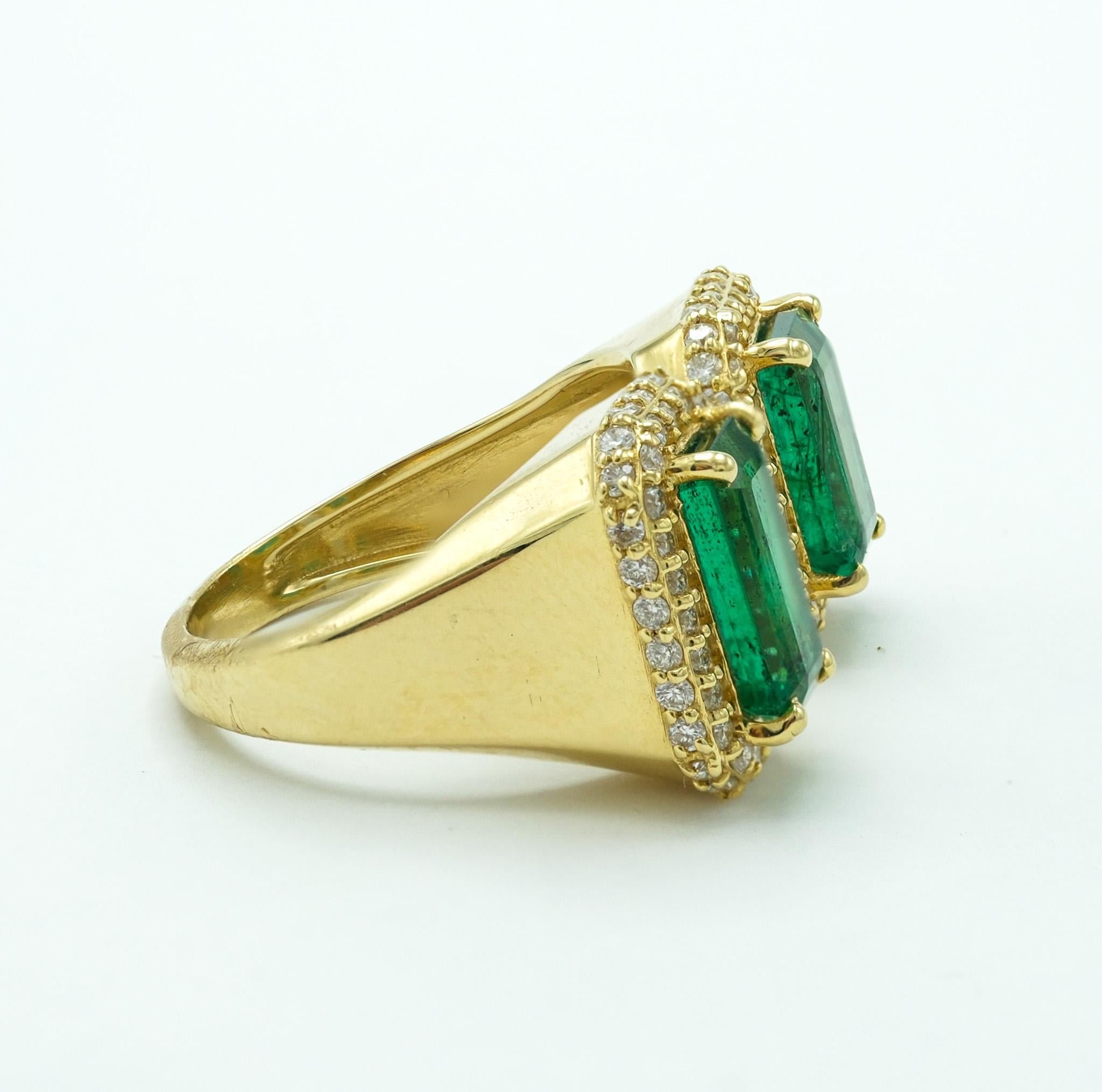 Two-Stone Emerald and Diamond 18 Karat Yellow Gold Emerald Cut Ring For Sale 1