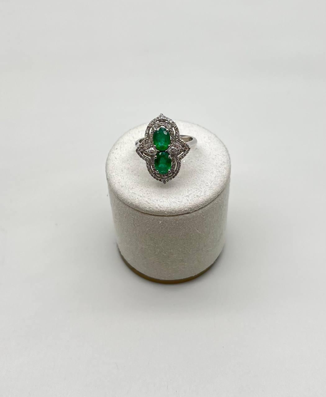 Elegant and Timeless. Set with Natural Oval Green Emeralds. Accented by Sparkling White Diamonds. 14K White Gold.