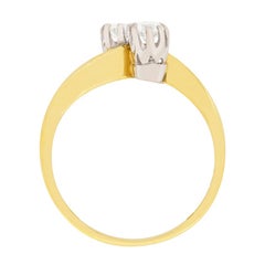 Two-Stone Round Brilliant Cut Diamond Crossover Ring, circa 1984