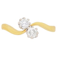 Two-Stone Round Brilliant Cut Diamond Crossover Ring, circa 1984