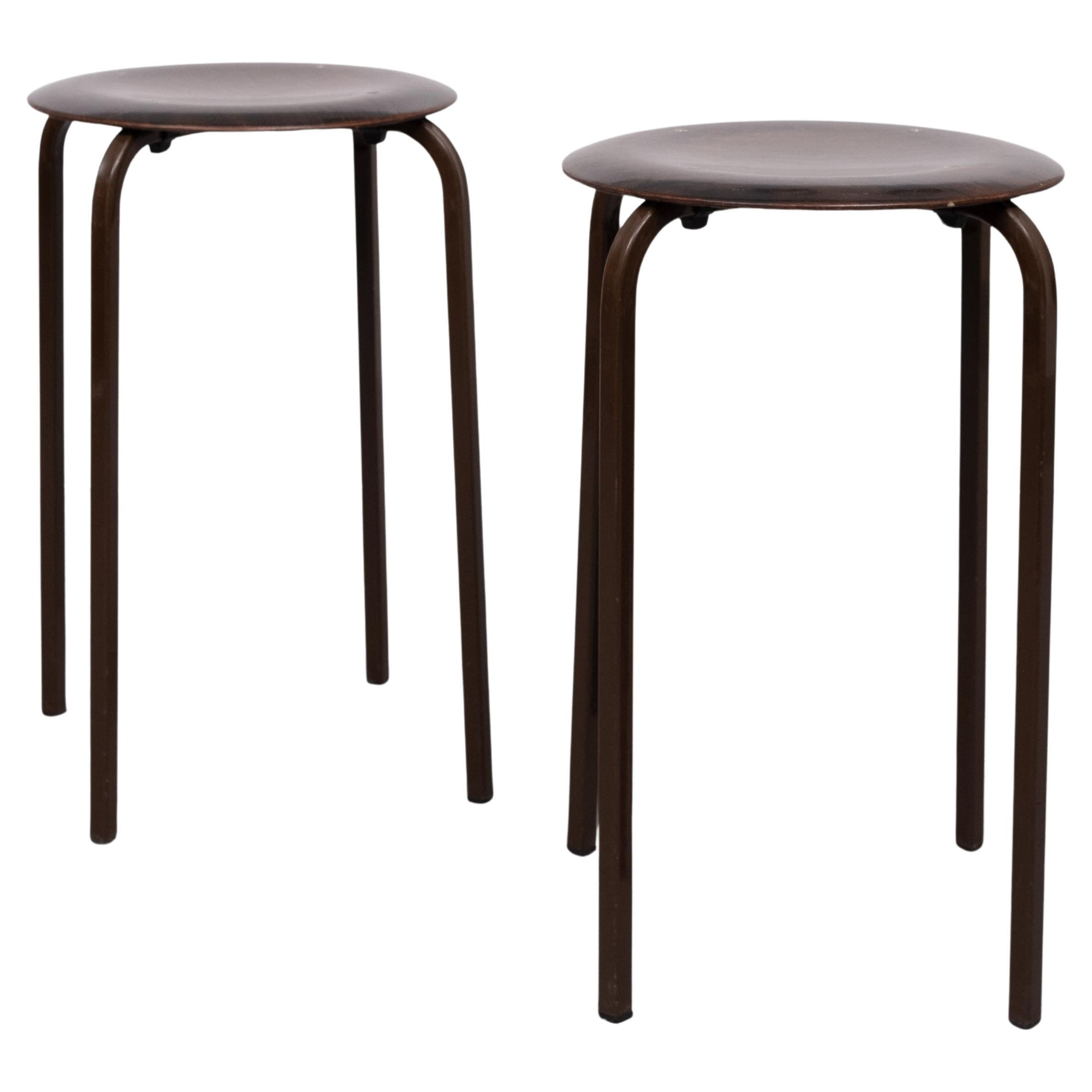 Two very nice stools ,Design by Obo Eromes  for Eromes
1960s Holland .Plywood seat . stack able . 