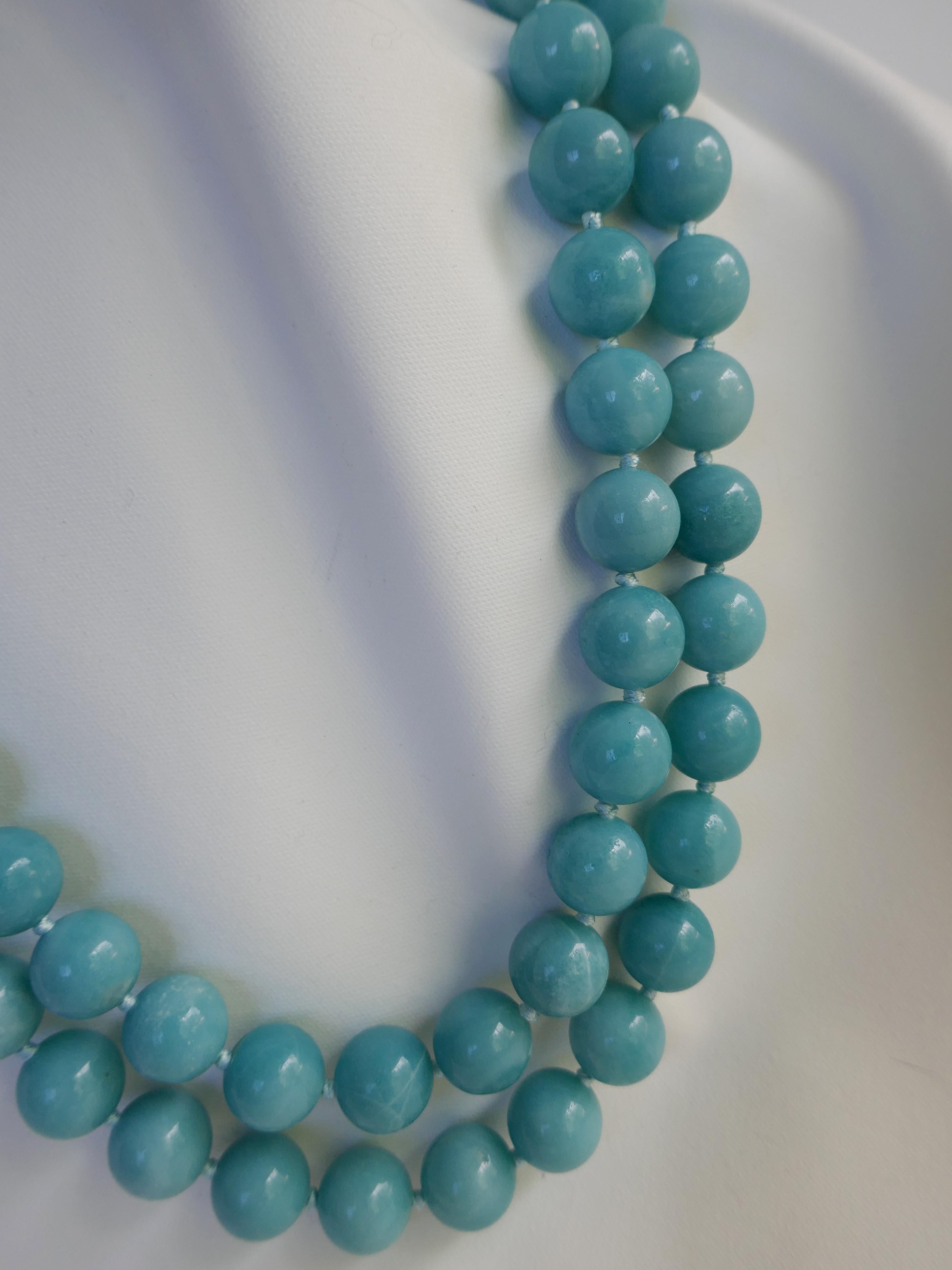 This double strand 14mm amazonite is a spectacular necklace. The color of the amazonite is beautiful and the necklace looks amazing on. Amazonite like turquoise is a neutral color stone and goes with many color. I wear mine year round, specially in