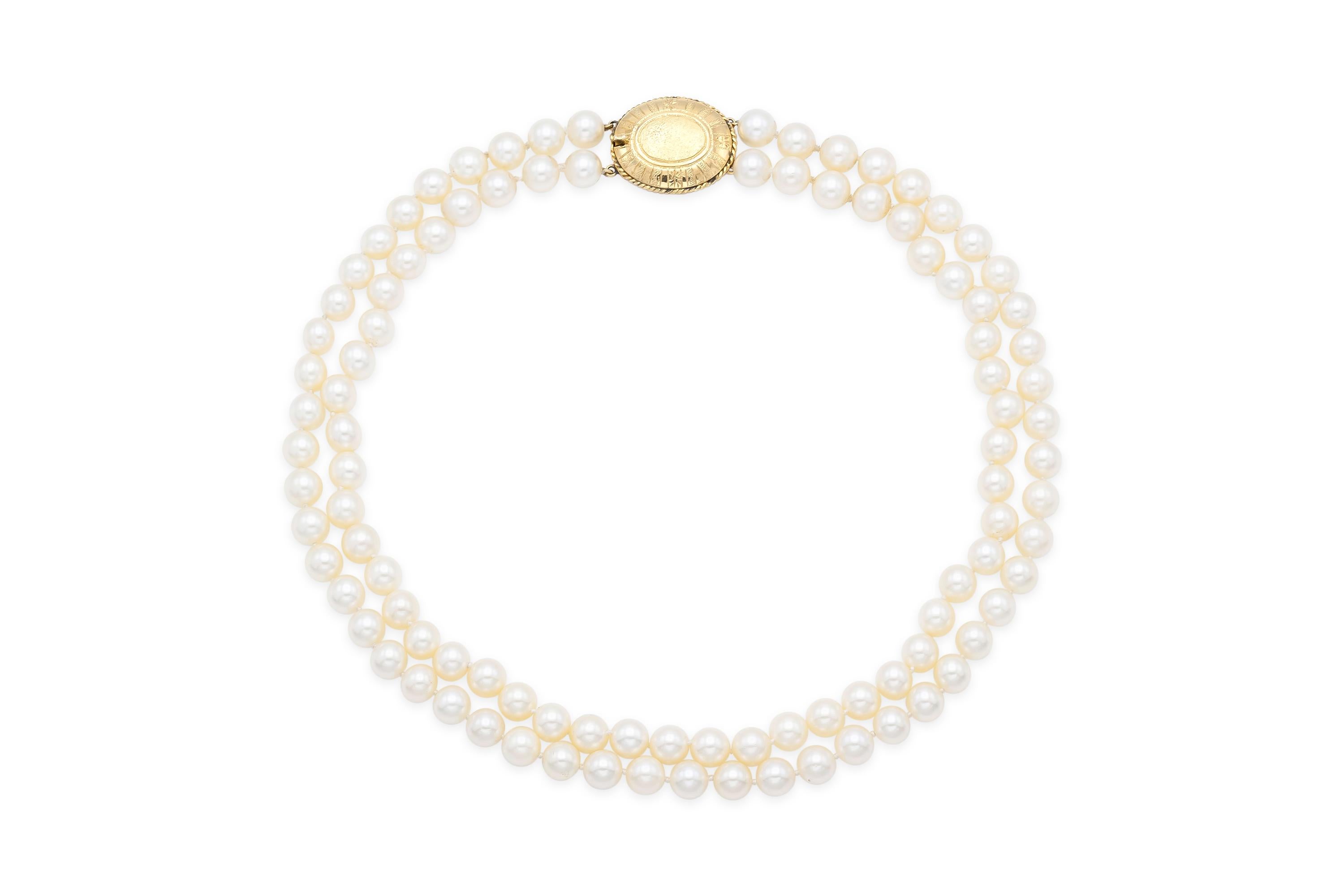 Finely strung with 100 pearls which measure 8 - 8 1/2 mm.
The clasp is finely crafted in 18k yellow gold.