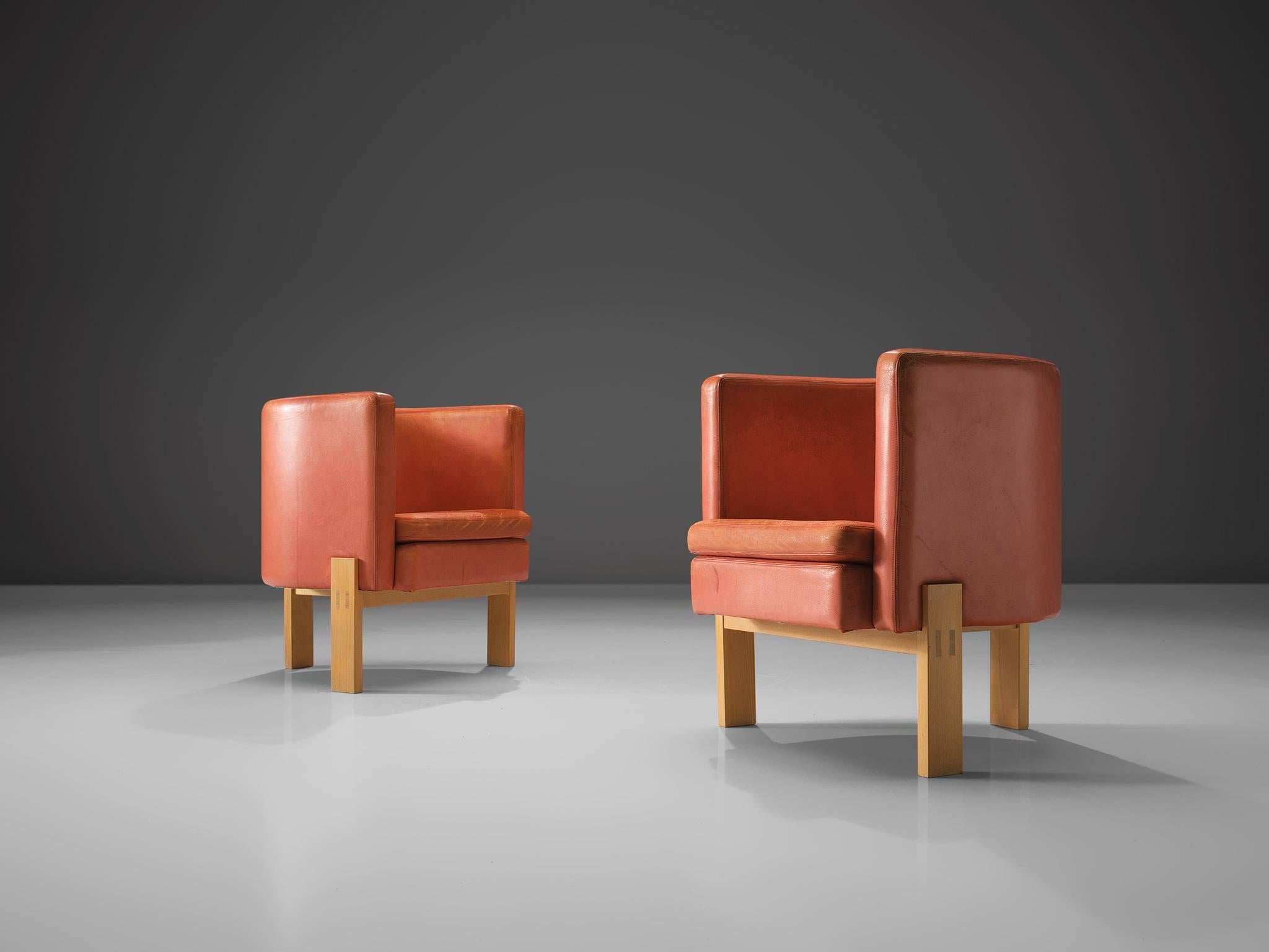 Erik Kalström, pair of chairs, red to coral leather, wood, Sweden, 1960s

This robust set of sober easy chairs are completely rounded and feature a mid high back and front. As a result, this settee works as a comforting shell that embraces the