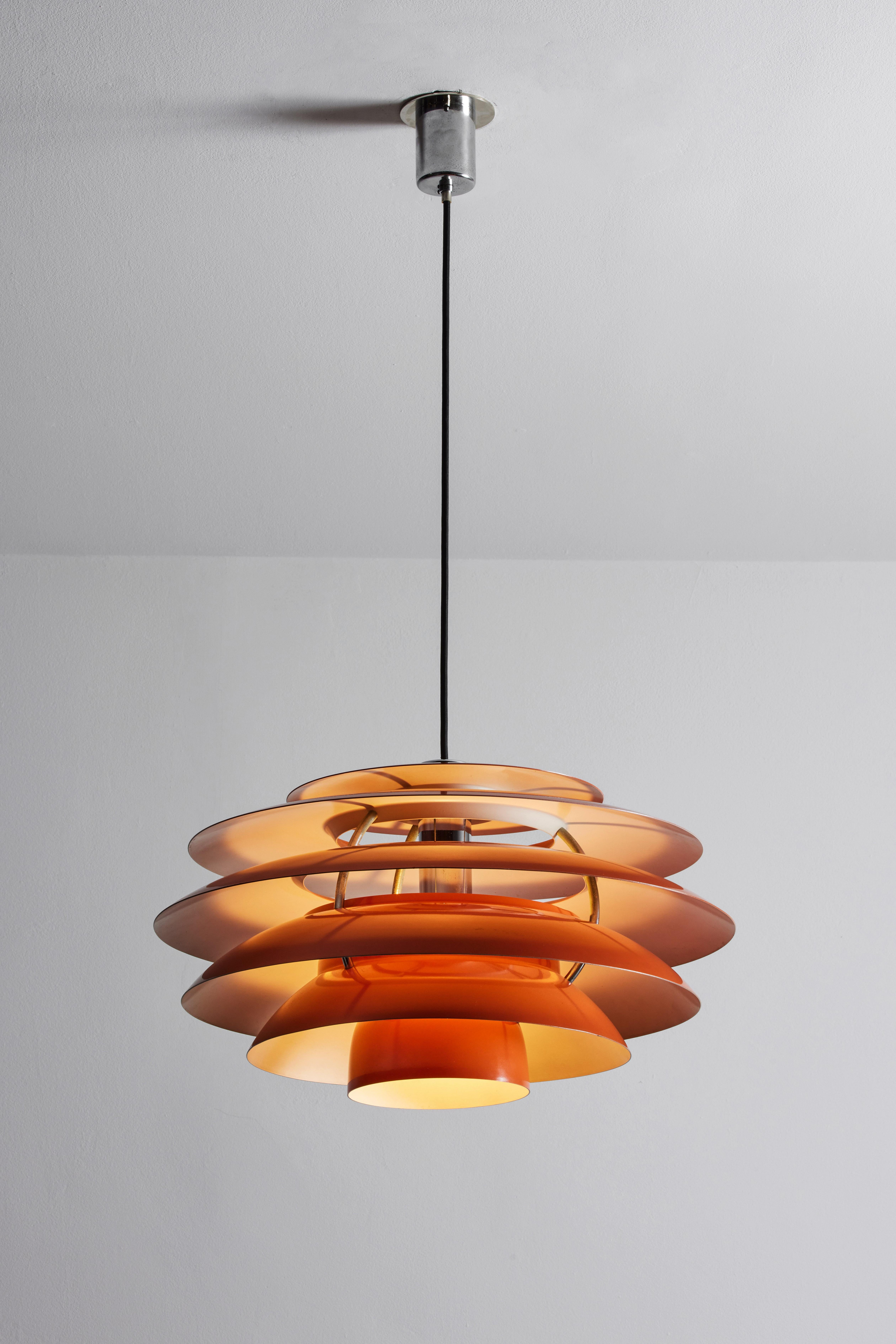 One suspension light by Stilnovo. Manufactured in Italy, circa 1960s. Enameled aluminum, chrome hardware. Rewired for U.S. junction boxes. Custom ceiling plates. We recommend one E26 75w maximum bulb per socket. Bulbs provided as a one time