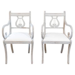 Two Swedish 1900s Lyre Back Painted Armchairs with Scrolled Arms and Saber Legs