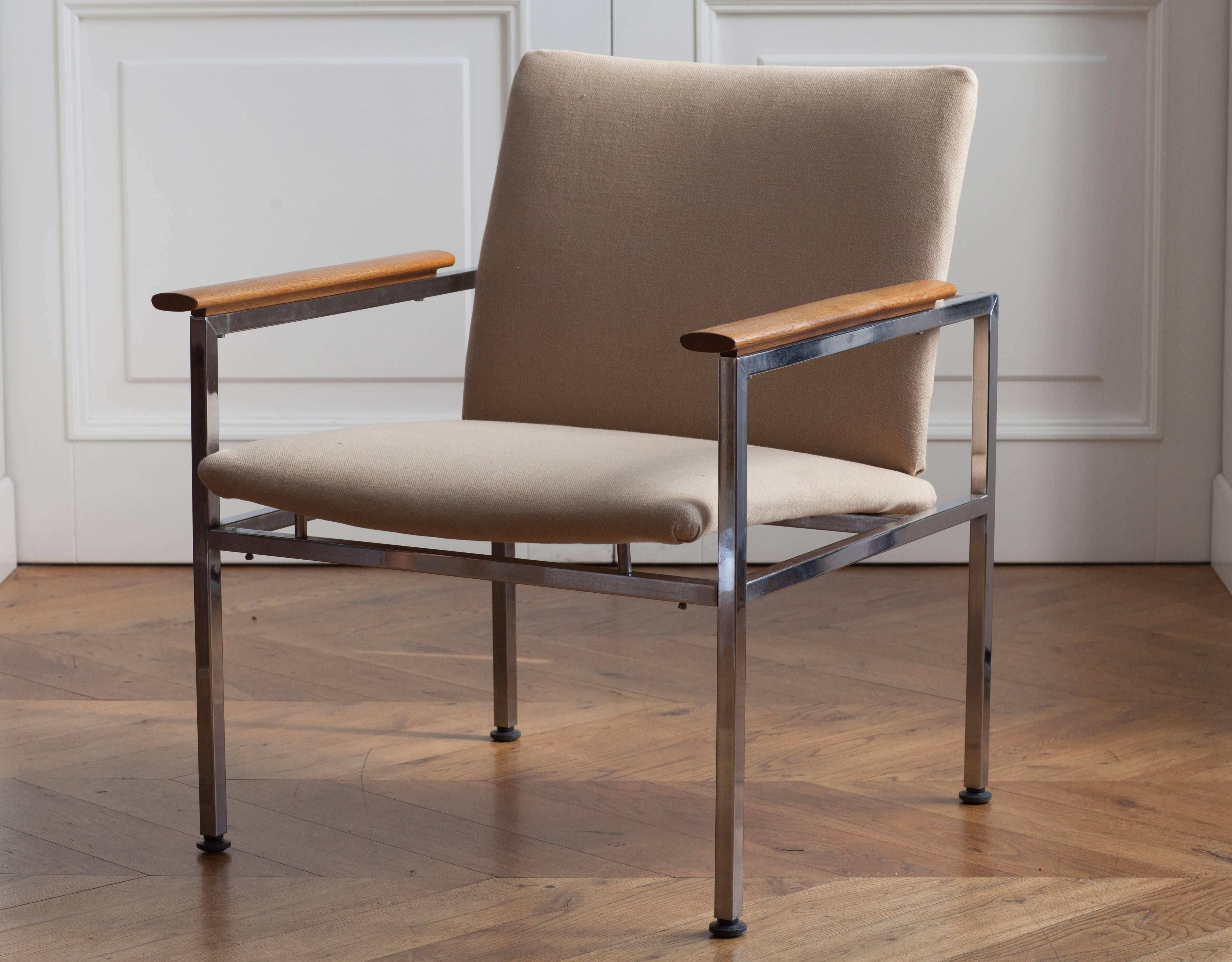 Two Swedish armchairs designed by Sigvard Bernadotte. The seats were designed for Stockholm airports in the 1960s. The seats are changed upholstery. The new fabric is cream-colored. The fabric is highly abrasive, upholstery. The fabric is Elitis