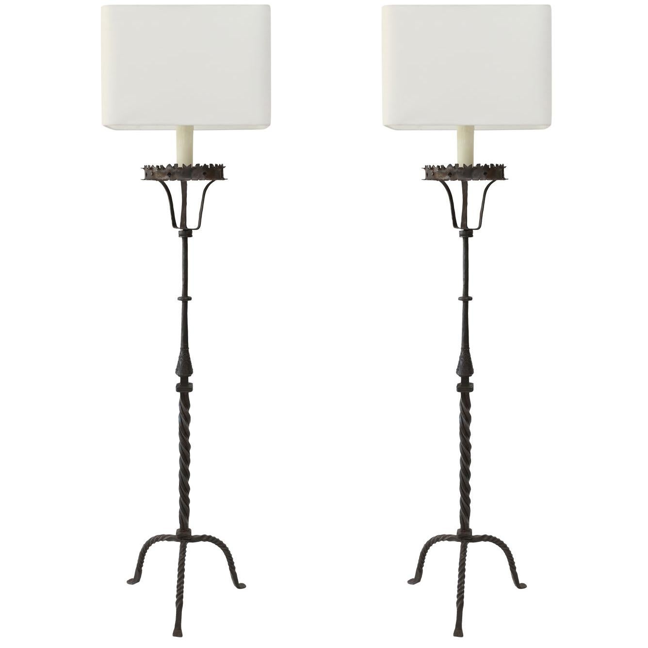 Two Tall Forged Iron Floor Lamps