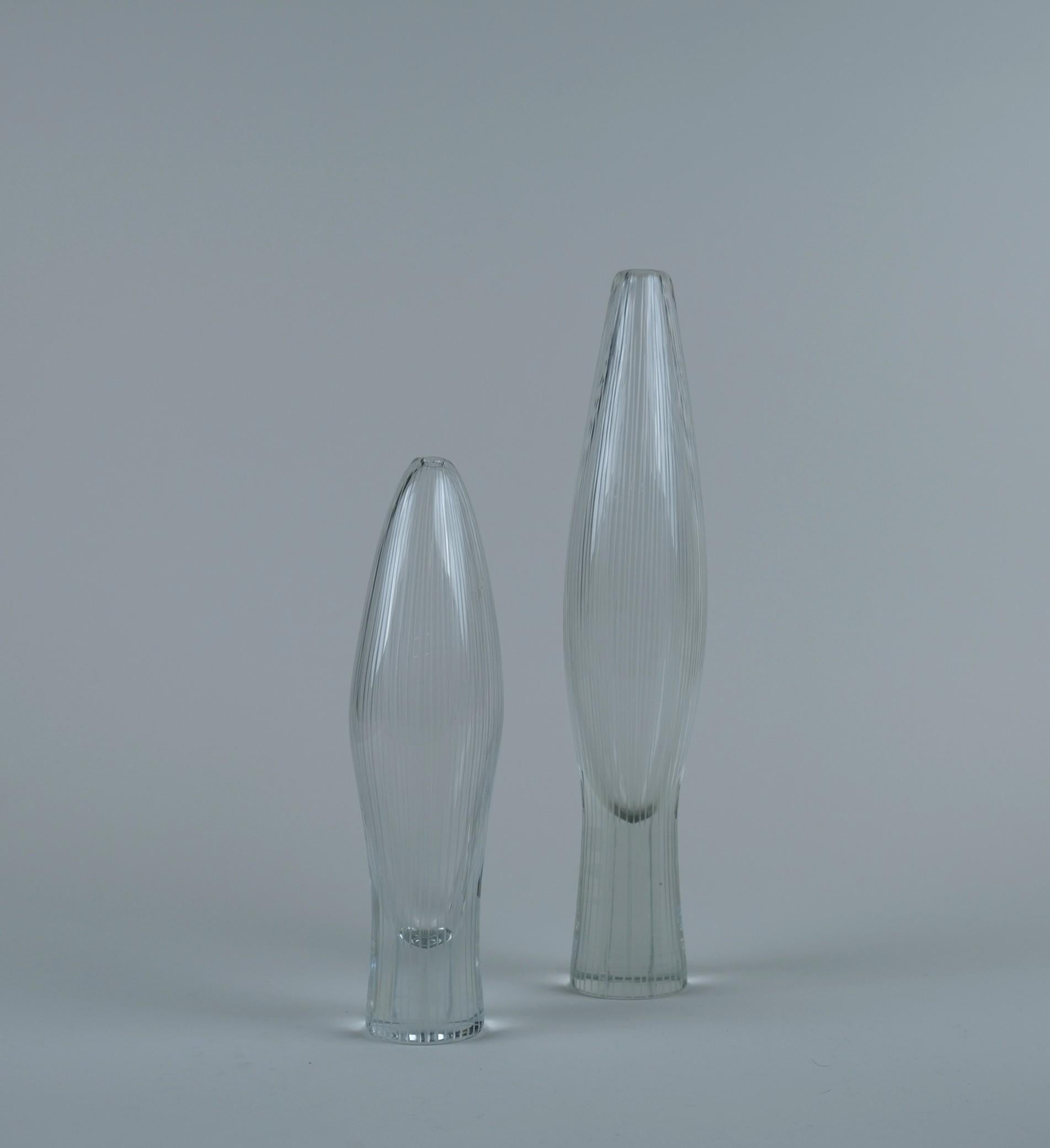 Two Tapio Wirkkala Tulip art objects / vases model 3561 for Iittala. As Wirkkala was inspired by nature, these pieces were no exception and he drew his inspiration from emerging tulips just before blossoming. This model came in these two different