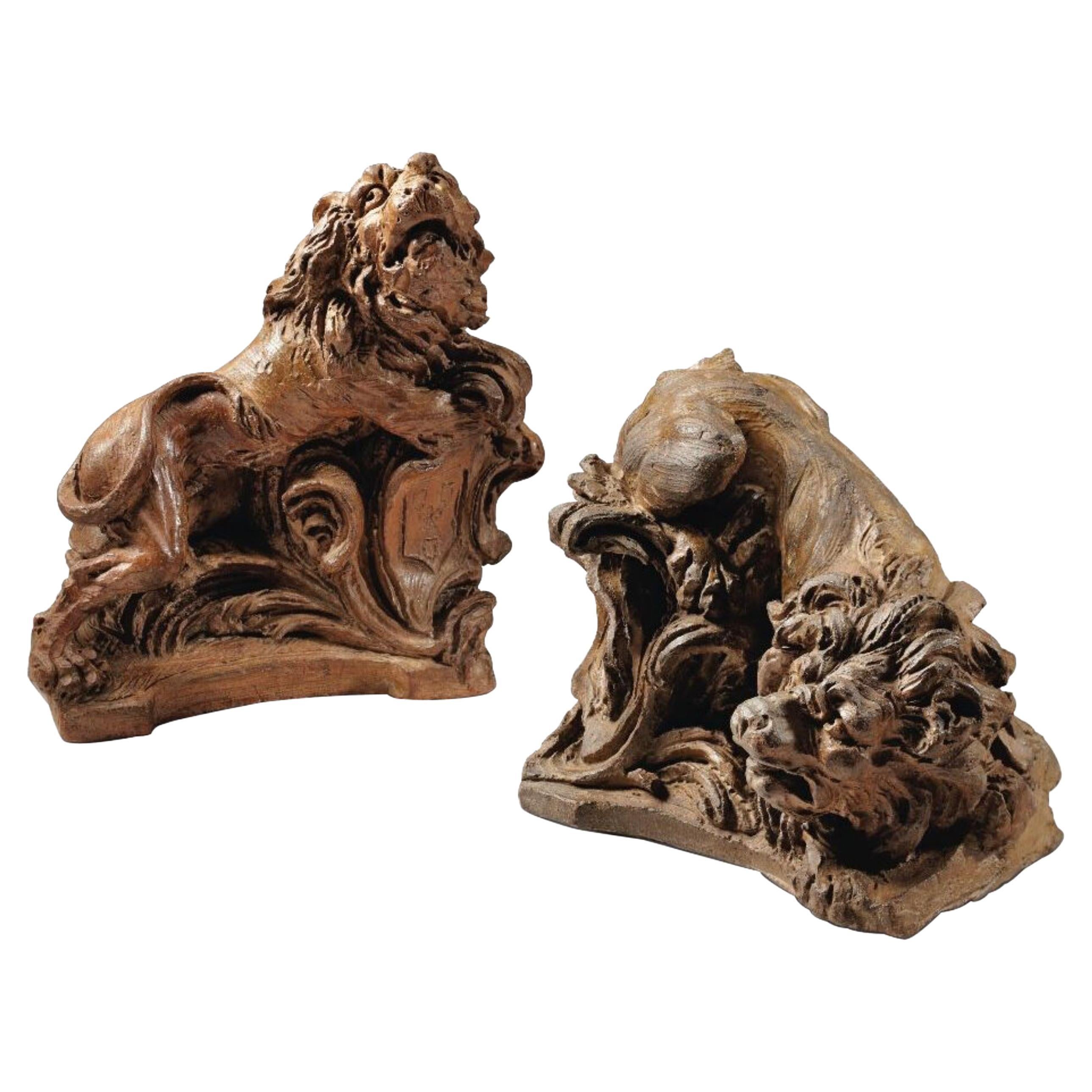 Two Terracotta Lions with Shields, French, Mid-18th Century For Sale