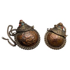 Two Tibetan Copper Snuff Bottles Decorated with Coral, Turquoise and Stone Inlay