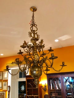 Two-Tier 12 Arm Brass Chandelier with Sunflower Reflectors, circa 1760