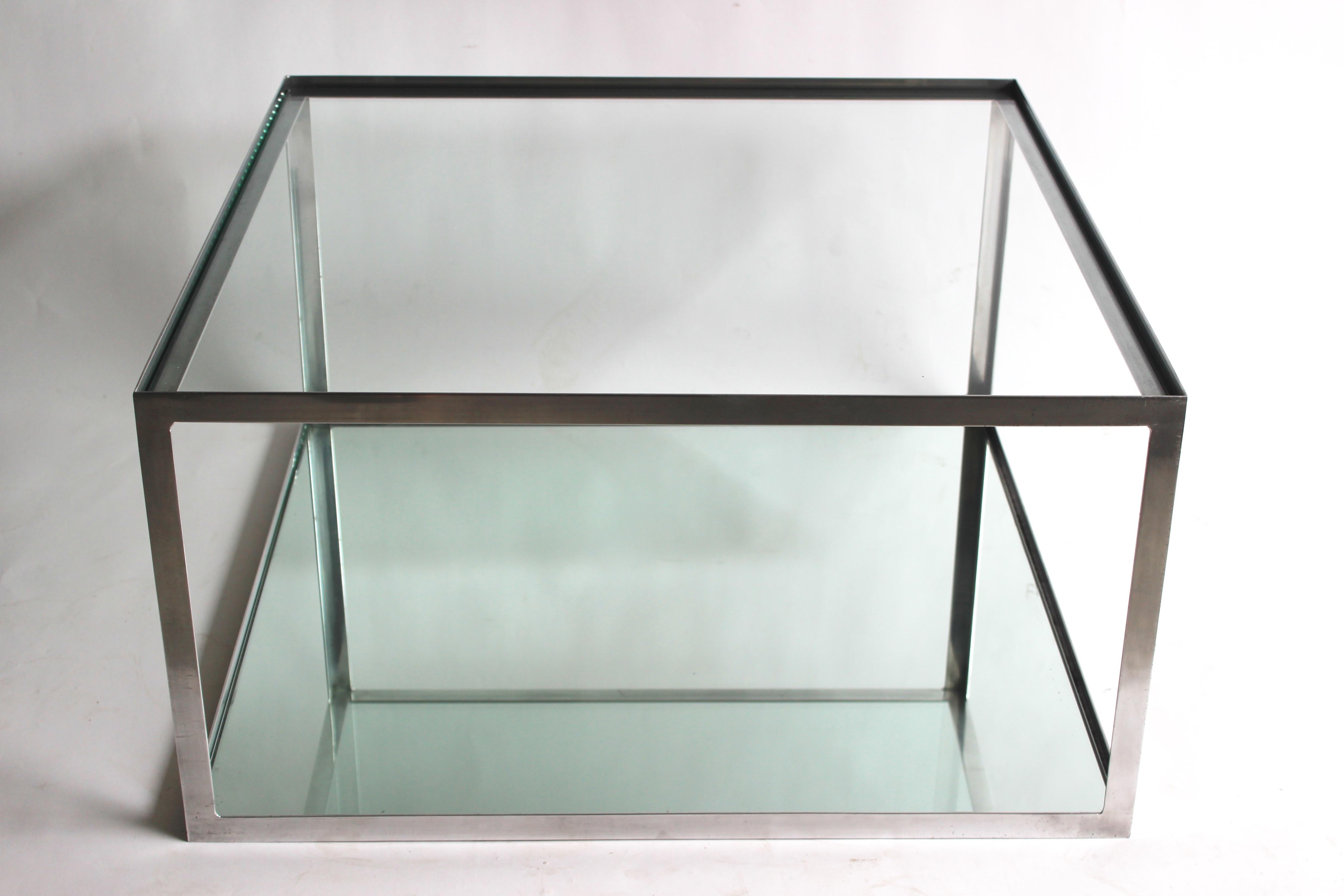 Two-tier Aluminium frame coffee table with clear glass top and a mirrored shelf on the bottom