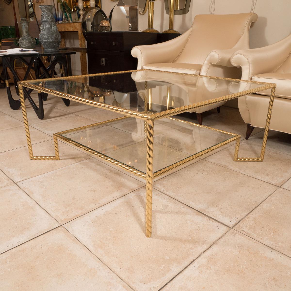 Two tier brass and glass coffee table with decorative 